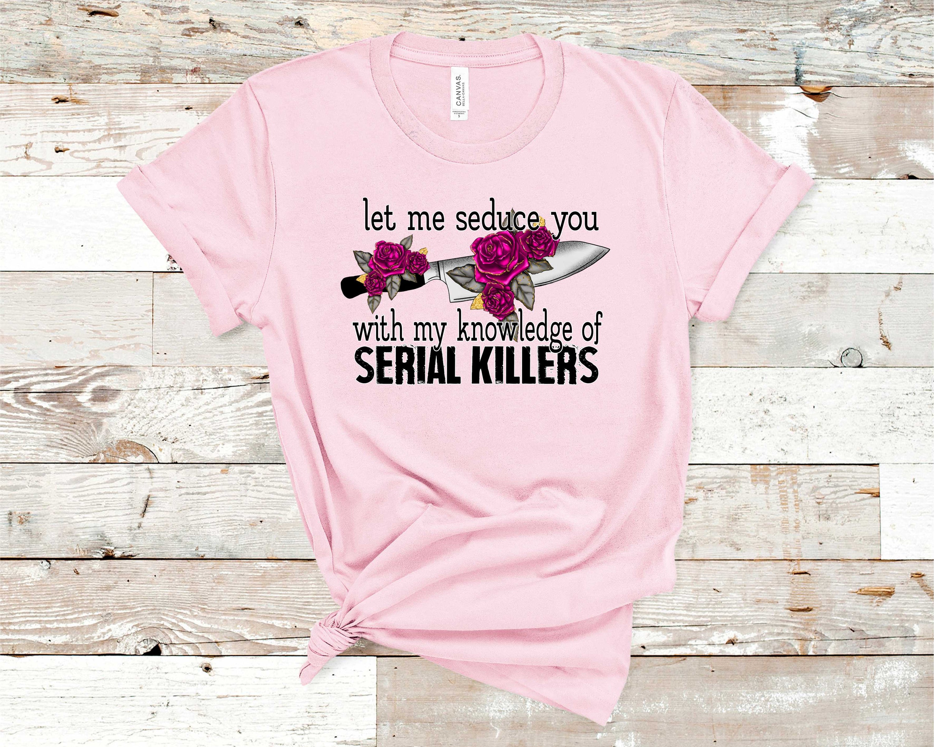 Knowledge of Serial Killers Graphic Tee featuring a unique design, suitable for unisex wear, made from high-quality fabric.