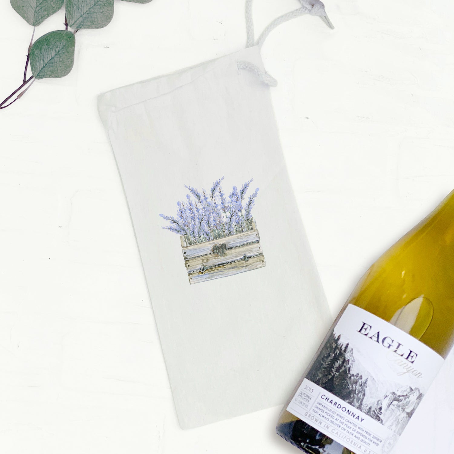 Lavender Basket Canvas Wine Bag with matching drawstring closure, designed to hold a standard 750mL wine bottle.