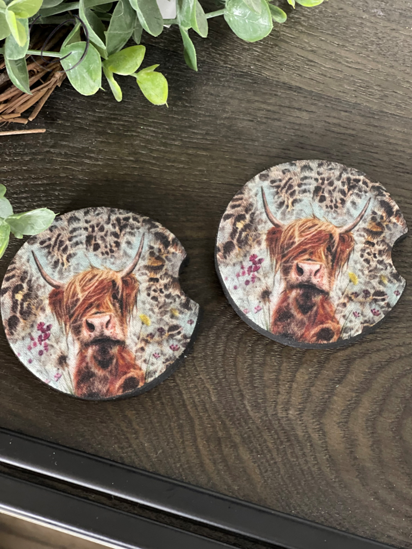 Leopard Highland Cow neoprene car coasters featuring a unique design, perfect for cup holders.