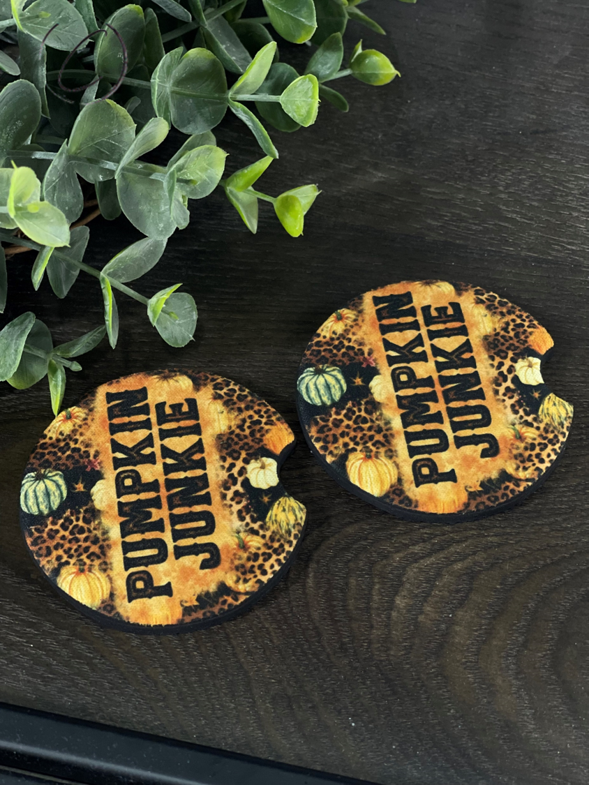 Leopard Pumpkin Junkie Car Coaster Set featuring a vibrant leopard pumpkin design on durable neoprene material.
