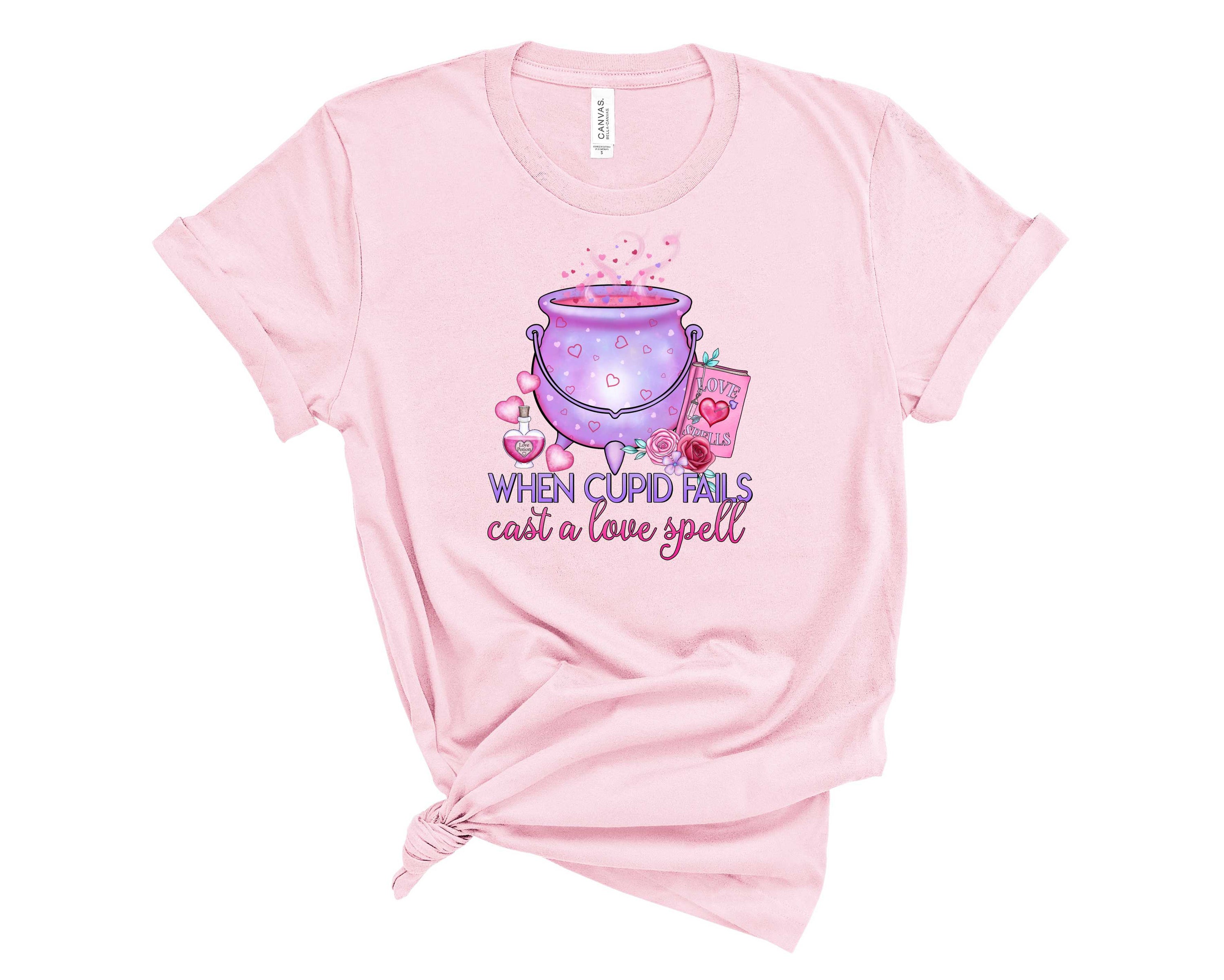 A unisex Love Spell Graphic Tee featuring a whimsical love-themed design, perfect for casual wear.