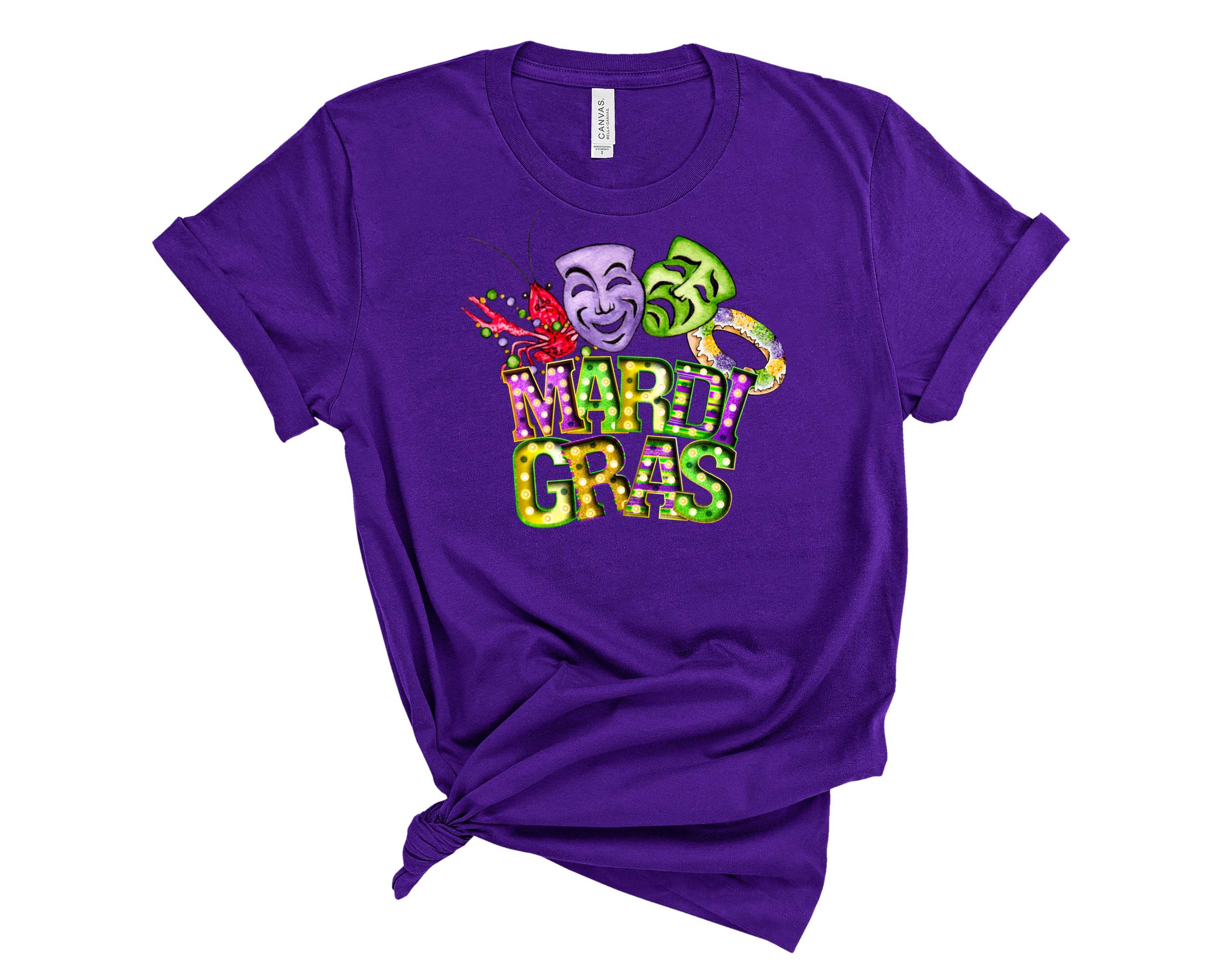 A vibrant unisex Mardi Gras mask graphic tee featuring colorful mask design, perfect for festive celebrations.