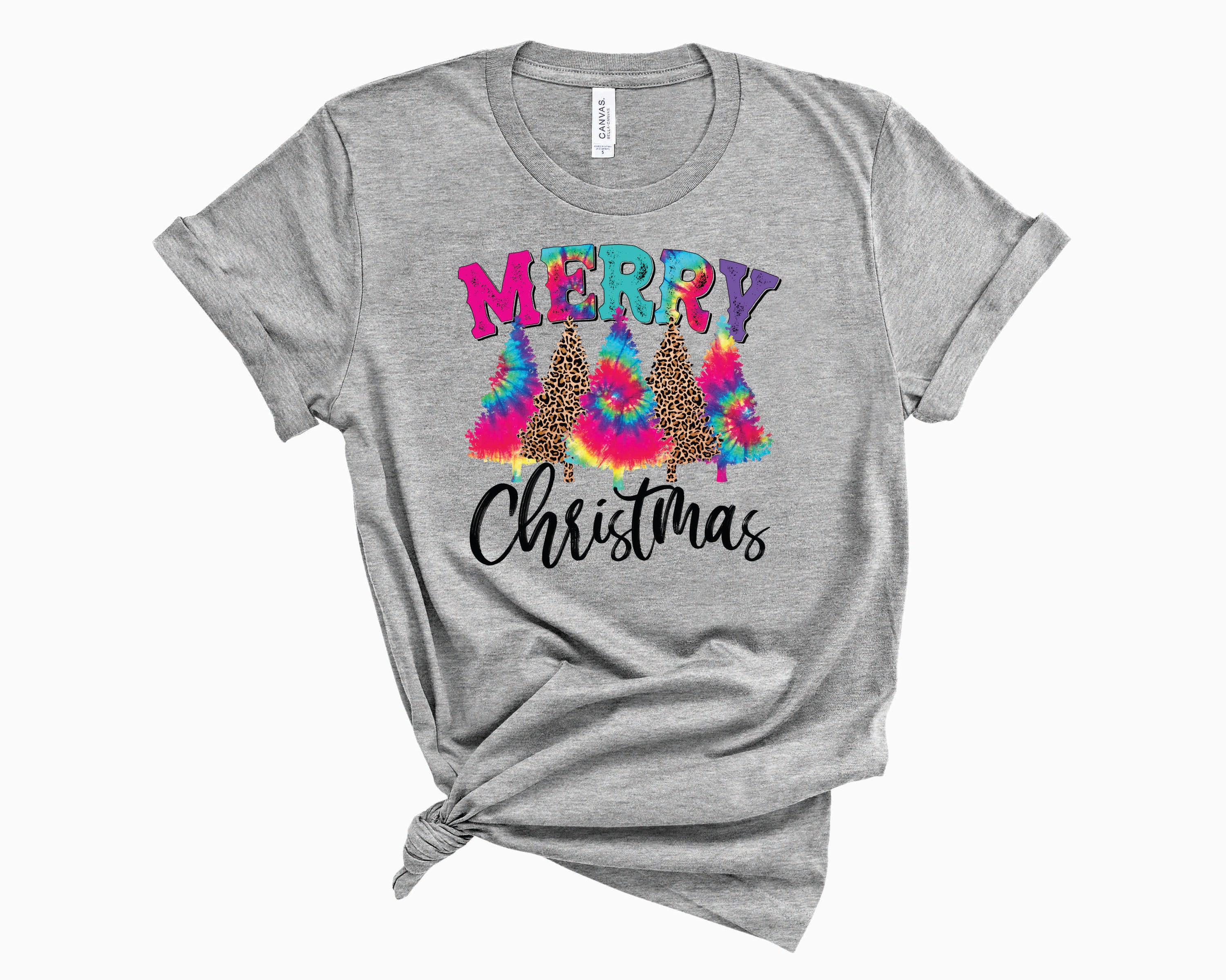 Merry Christmas Trees Rainbow Tie Dye Graphic Tee featuring vibrant colors and festive design, perfect for holiday celebrations.