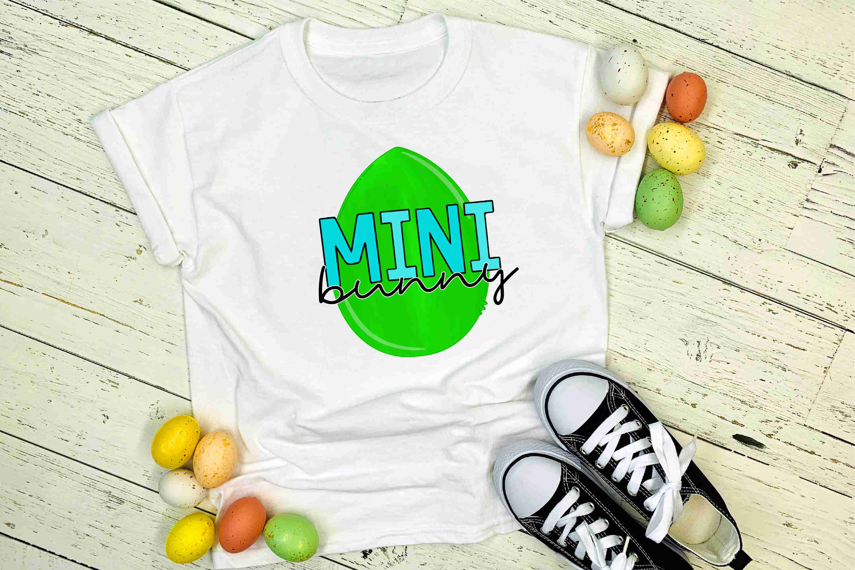 MINI Bunny Green Blue Graphic Tee featuring a playful bunny design on a vibrant background, perfect for casual wear.