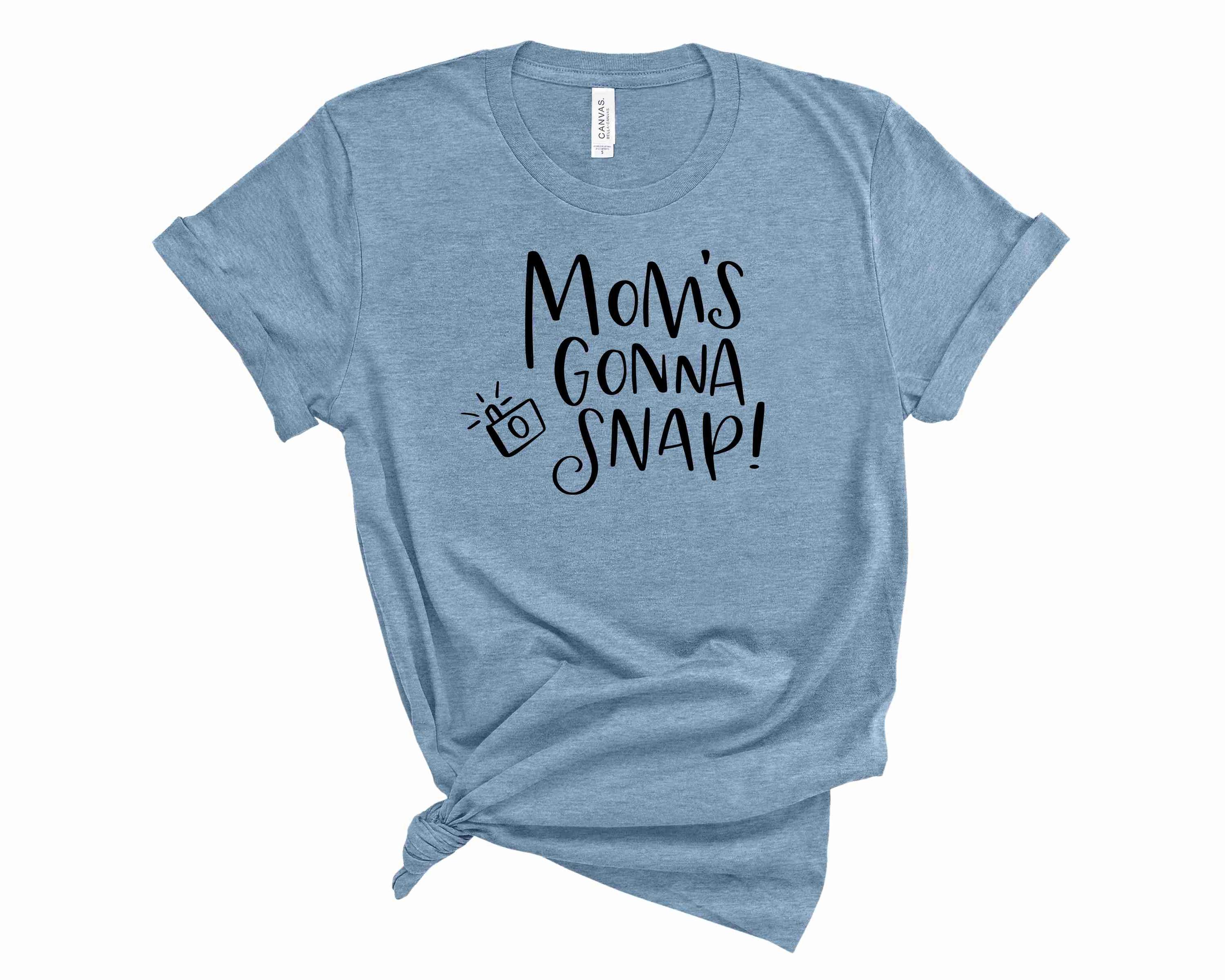 A unisex graphic tee featuring the phrase 'Mom's Gonna Snap' in bold letters, perfect for casual wear.