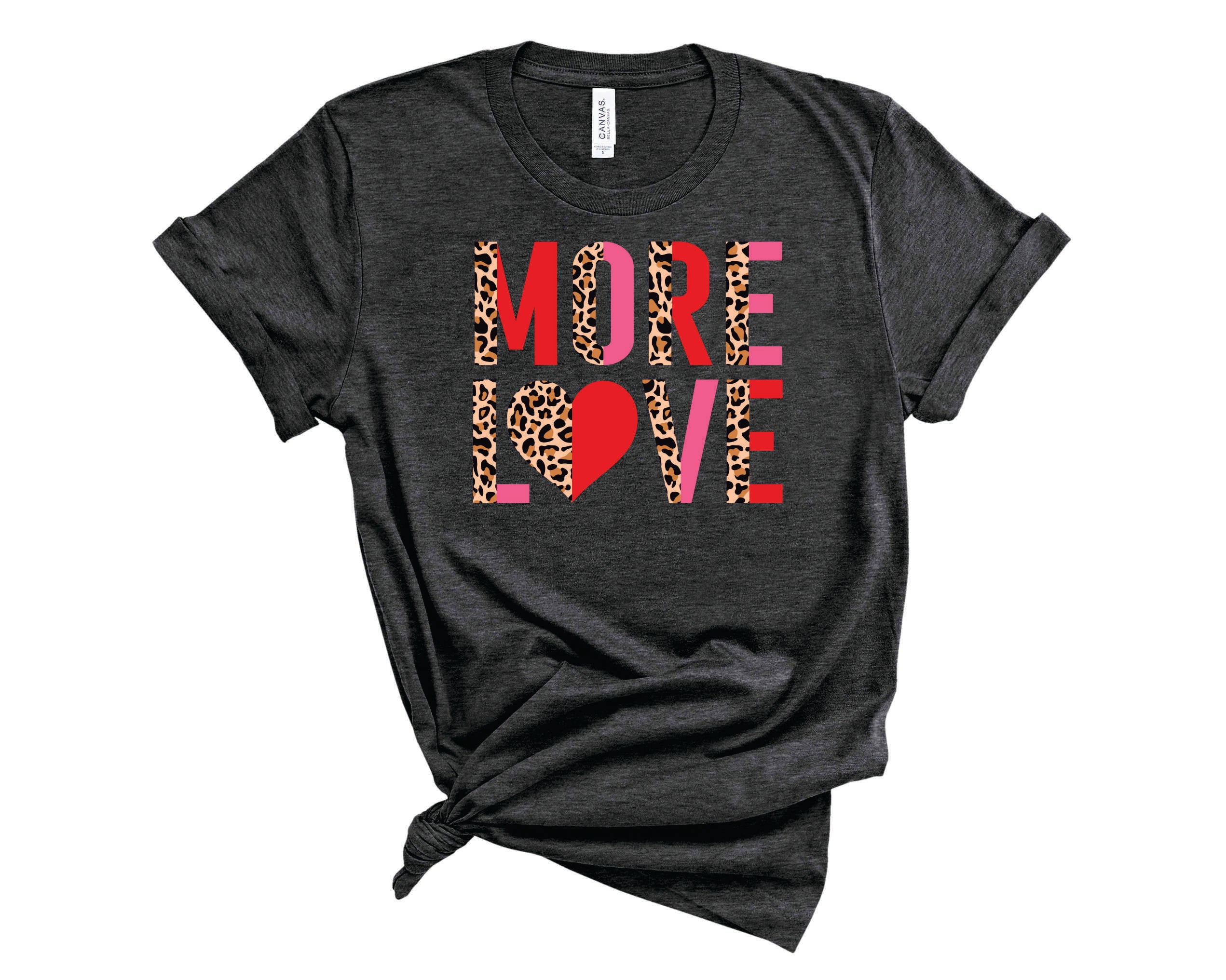 More Love Half Leopard Graphic Tee featuring a trendy half leopard print design on a soft unisex t-shirt.
