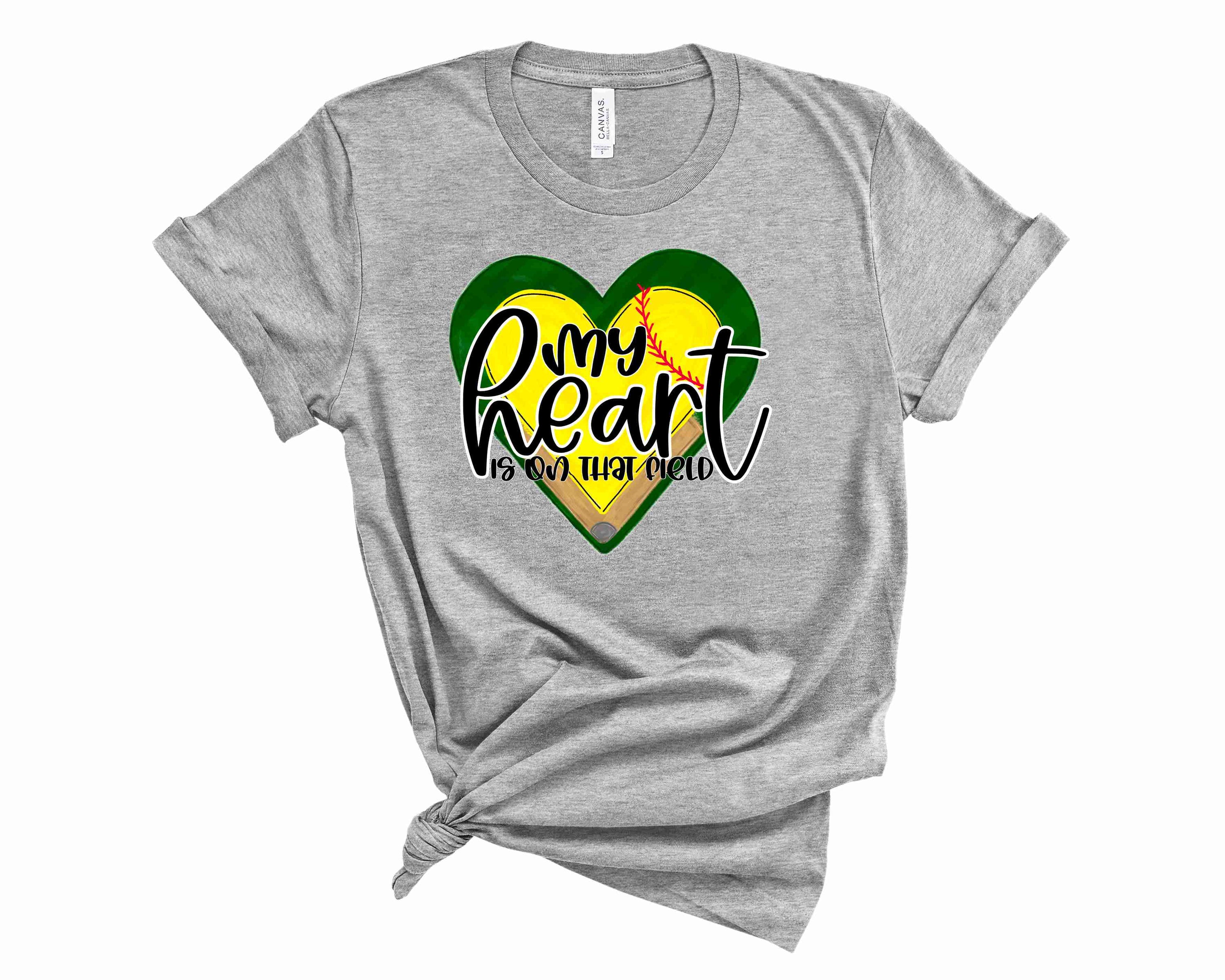 Unisex My Heart is on That Field Softball graphic tee featuring a bold design and comfortable fabric.