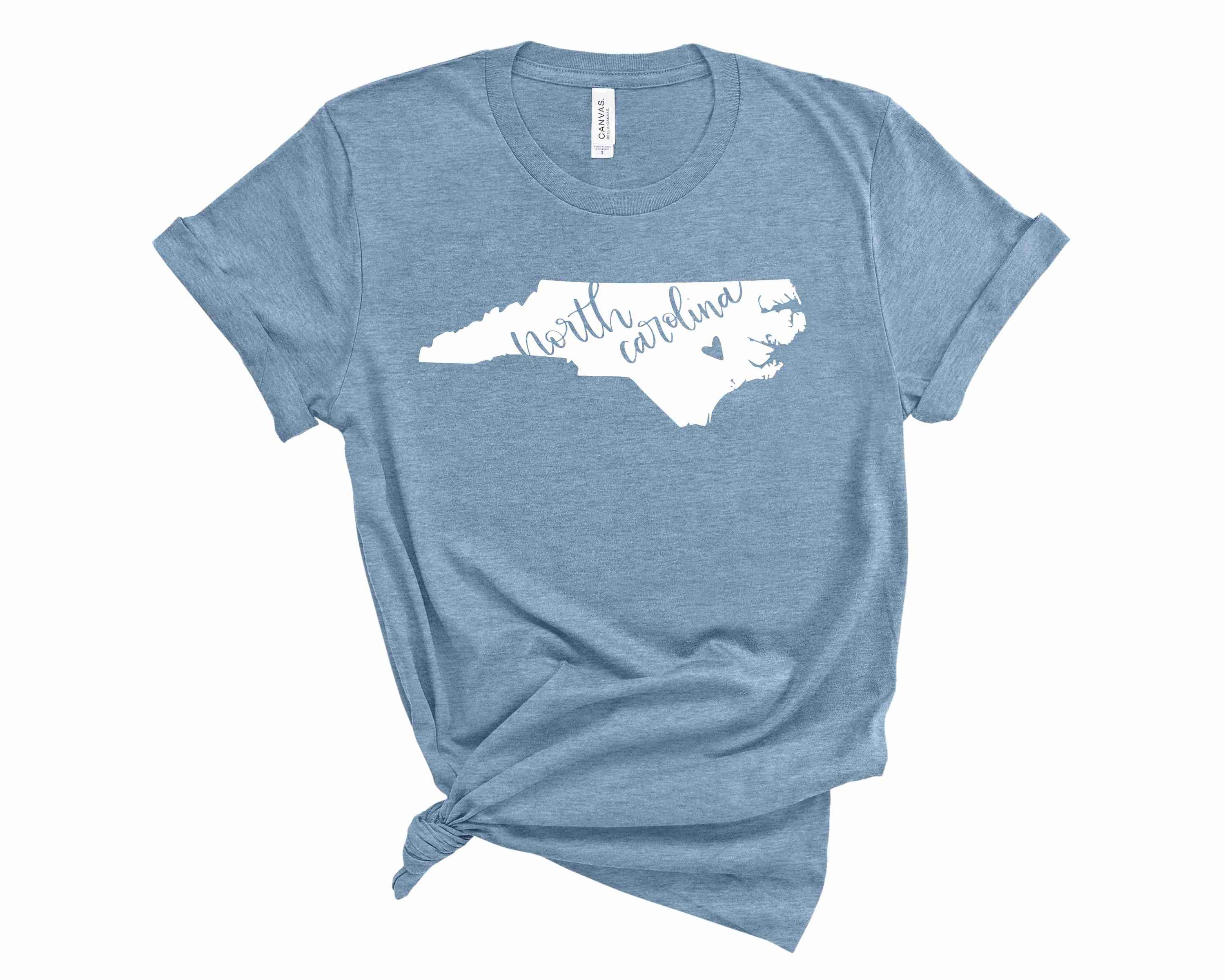 A unisex North Carolina Heart graphic tee featuring a heart design with the outline of North Carolina.