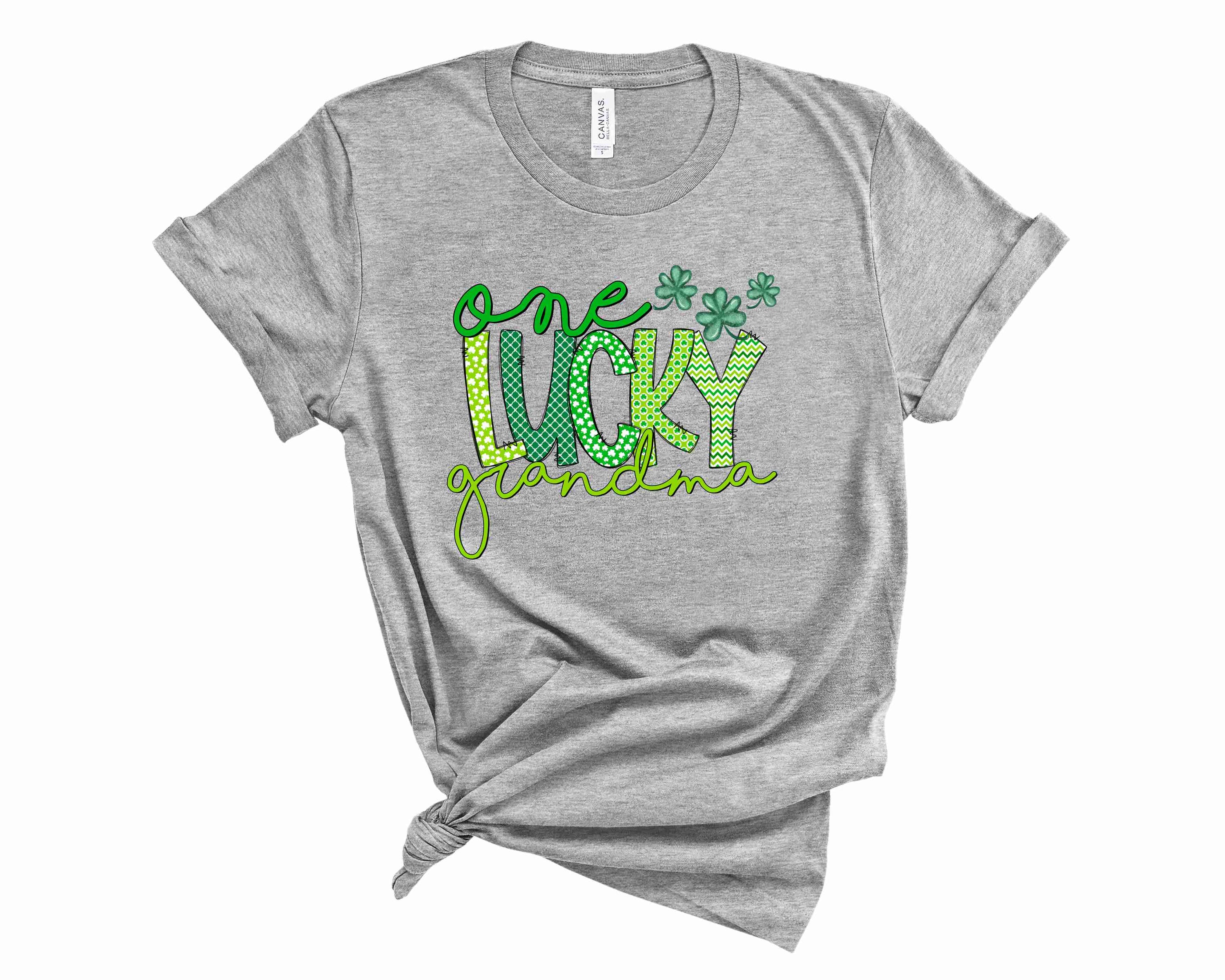 One Lucky Grandma graphic tee featuring bold text and a stylish design, perfect for casual wear.