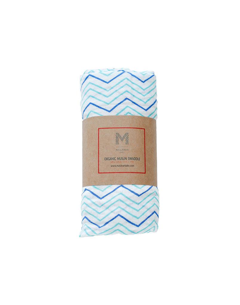 Luxuriously soft organic cotton swaddle in Chevron design, perfect for snuggling and versatile use.