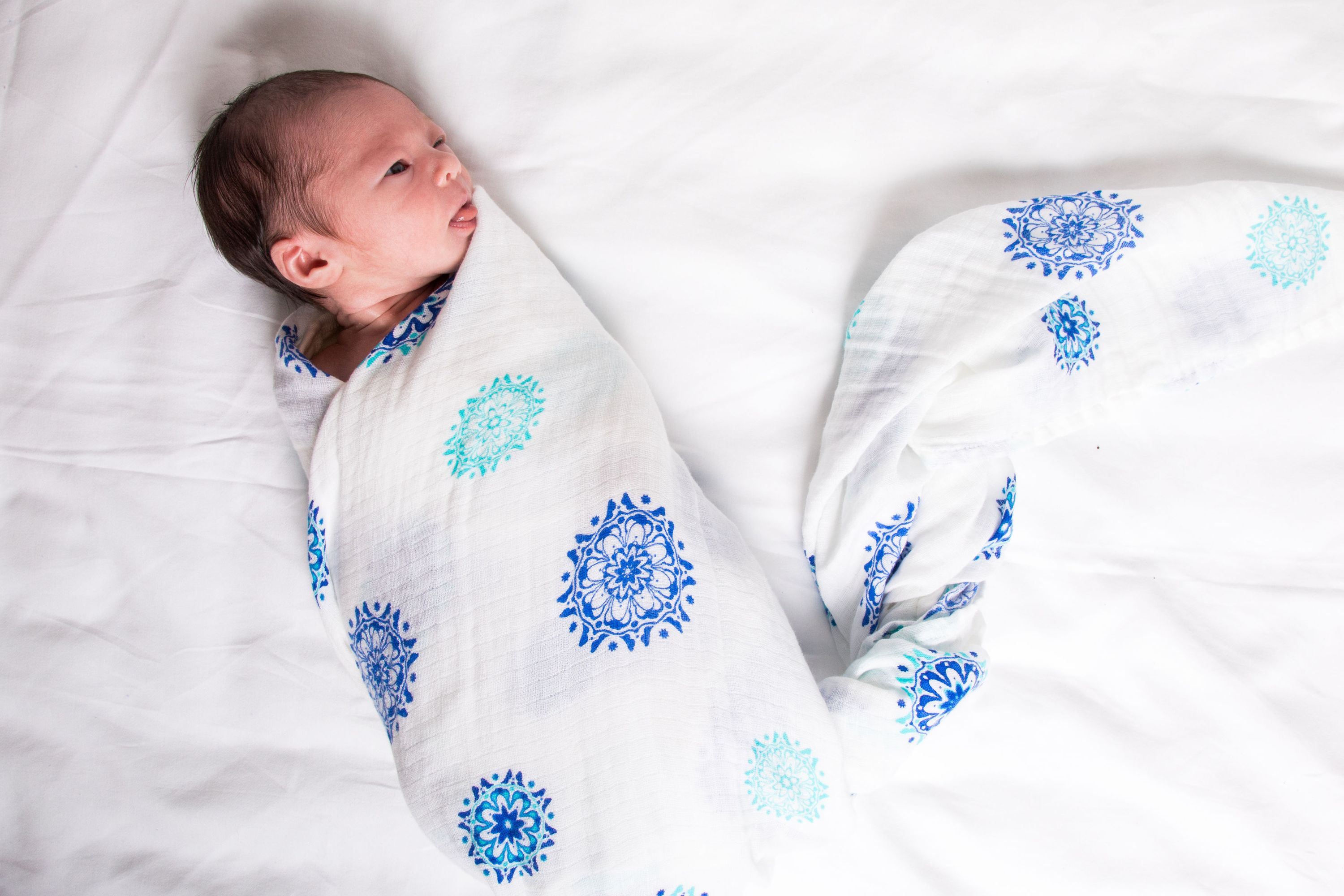 Organic Swaddle - Mandala made from soft GOTS certified cotton, featuring a beautiful mandala design, perfect for wrapping babies comfortably.