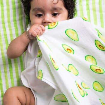 Organic Swaddle Set featuring Avocado and Lime Green Stripes, made of soft cotton, perfect for babies.