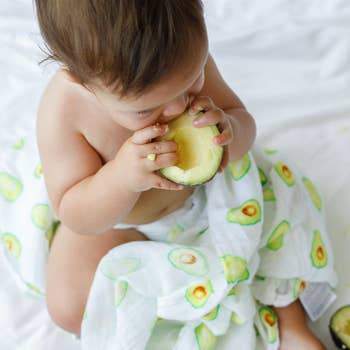 Organic Swaddle Set featuring Avocado and Lime Green Stripes, made of soft cotton, perfect for babies.
