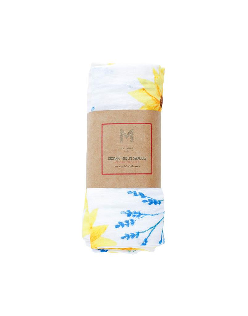 Organic Swaddle in Sunflower design, made from soft GOTS certified cotton, perfect for snuggling and versatile use.
