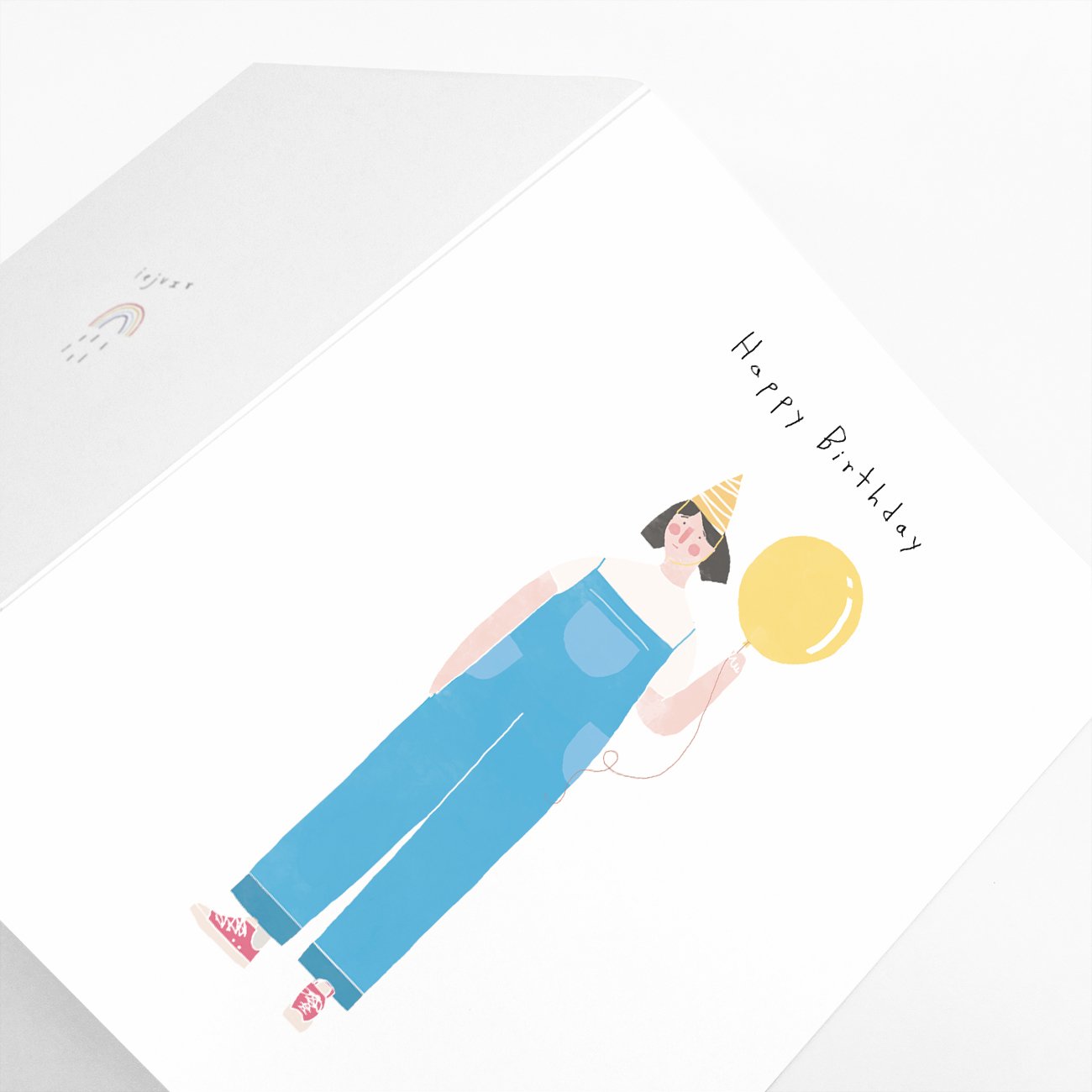 Happy Birthday overalls card made from recycled paper, featuring a cheerful design and blank interior for personal messages.