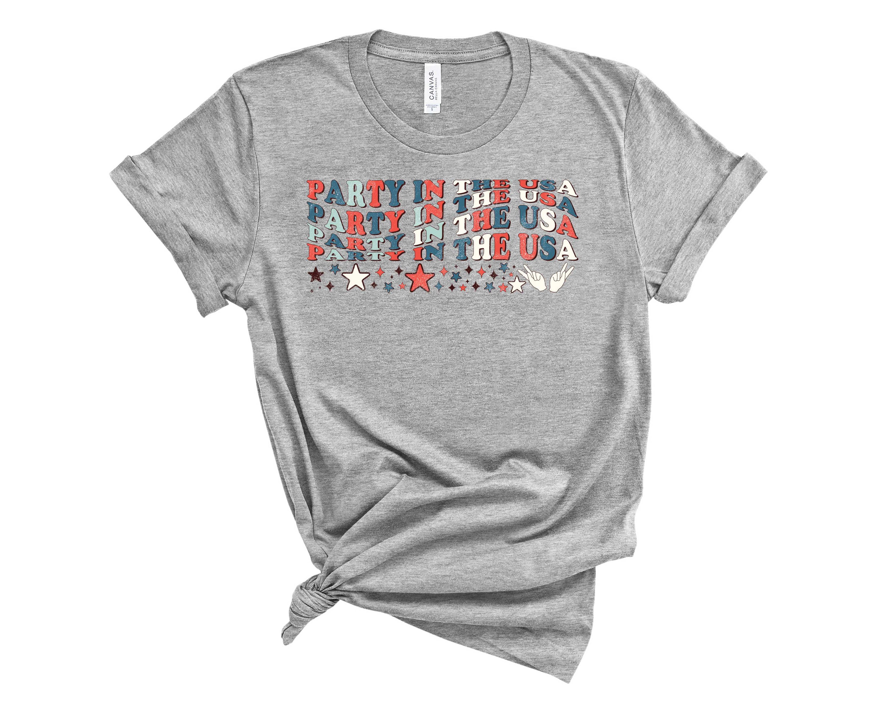 A vibrant unisex graphic tee featuring the text 'Party in the USA' in bold colors, perfect for casual wear.