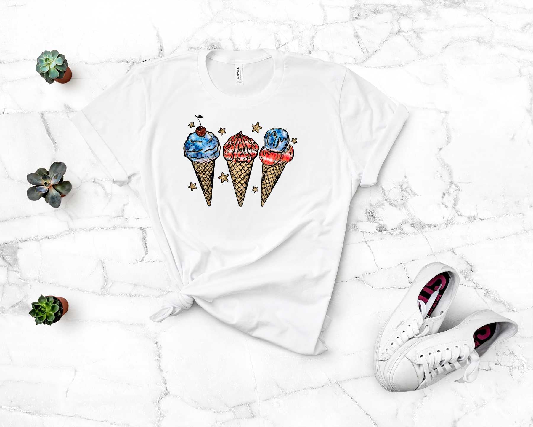 A unisex graphic tee featuring a colorful ice cream cone design with patriotic elements, perfect for summer wear.
