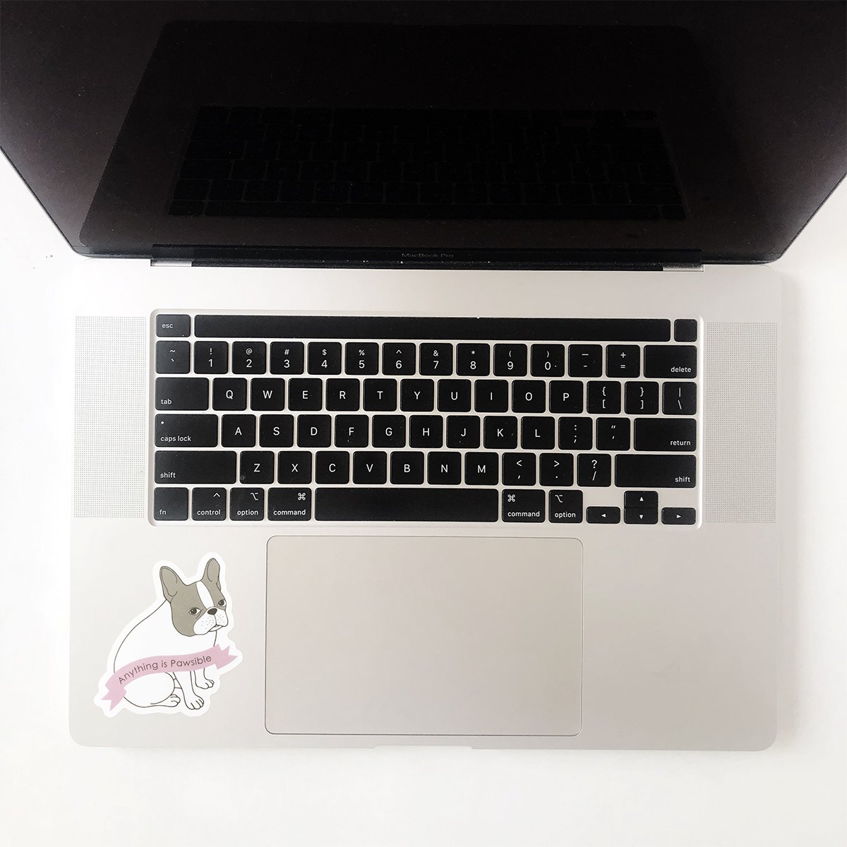 Pied Frenchie waterproof sticker featuring an adorable French bulldog design, perfect for personalizing smooth surfaces.