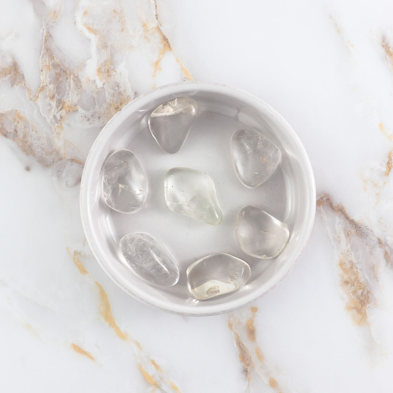 Pierre roulée en Cristal de Roche naturel, polie et transparente, provenant du Brésil, idéale pour la lithothérapie.