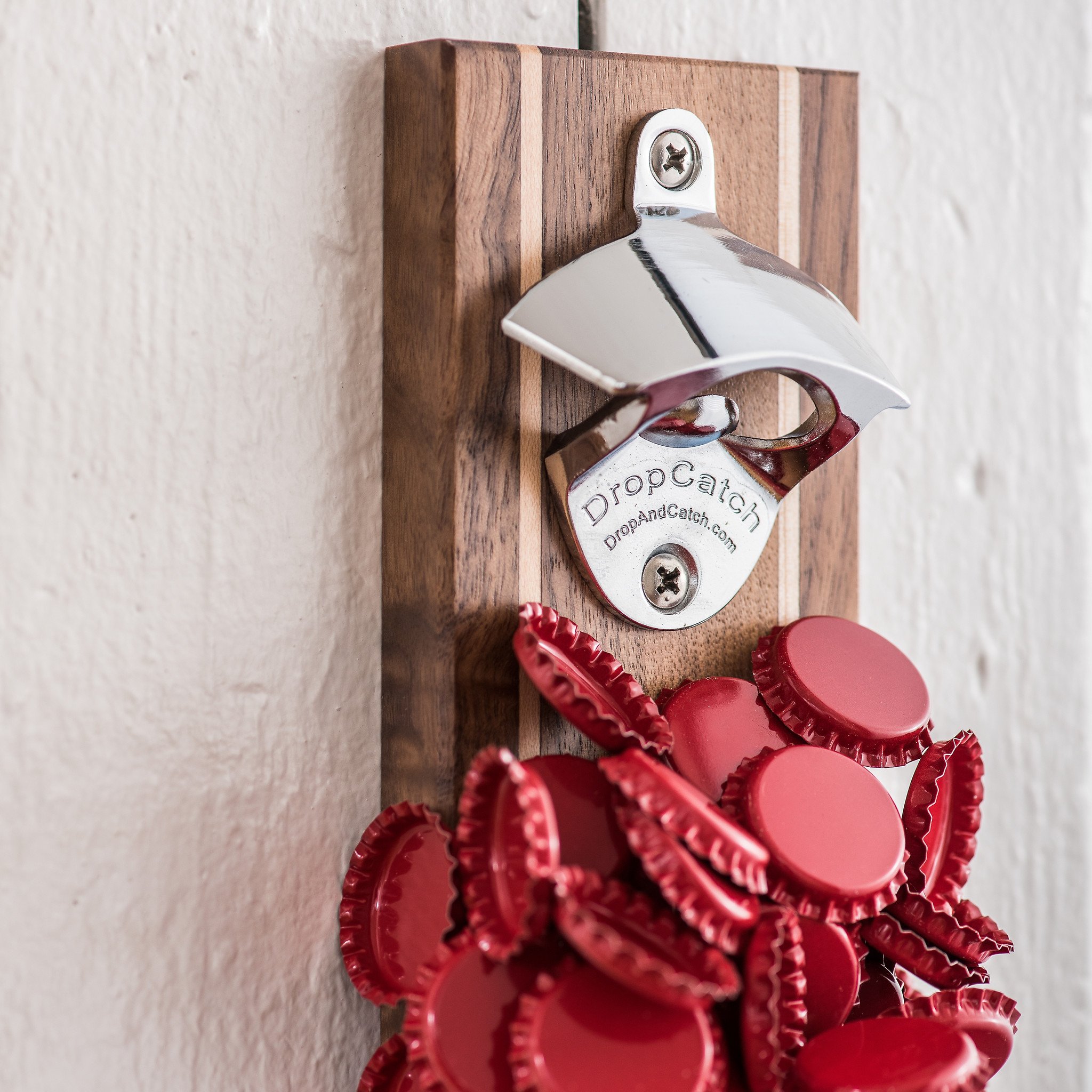 Handcrafted Pilsner Bottle Opener made from quartersawn walnut wood with maple inlays, featuring a magnetic and wall mounting option.