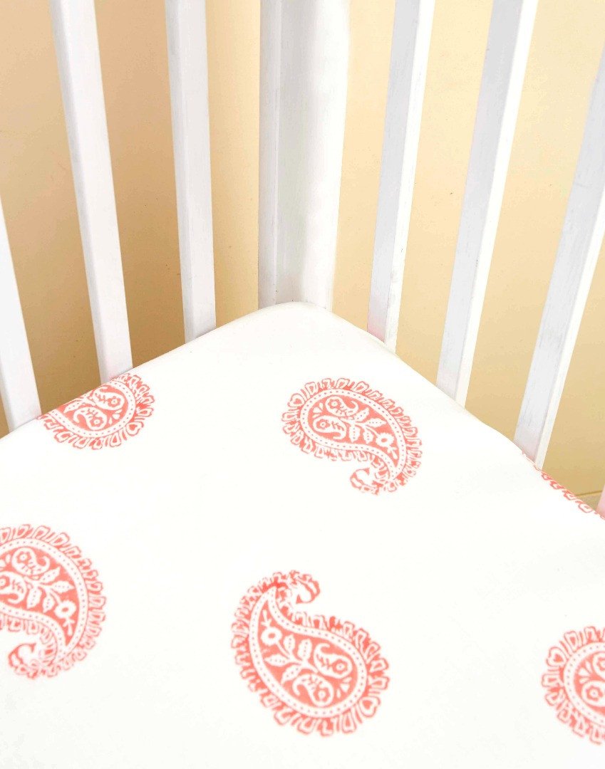 PINK CITY FITTED CRIB SHEET made from 200-thread-count cotton percale, featuring concealed elastic for a snug fit.