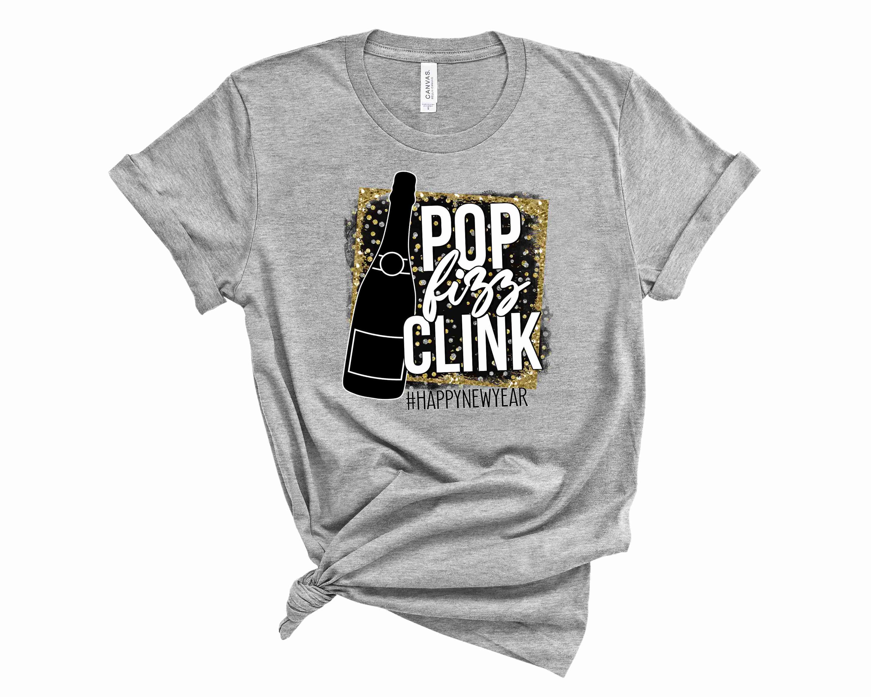 Pop Clink Fizz Graphic Tee displayed on a hanger, showcasing its vibrant design and unisex fit.