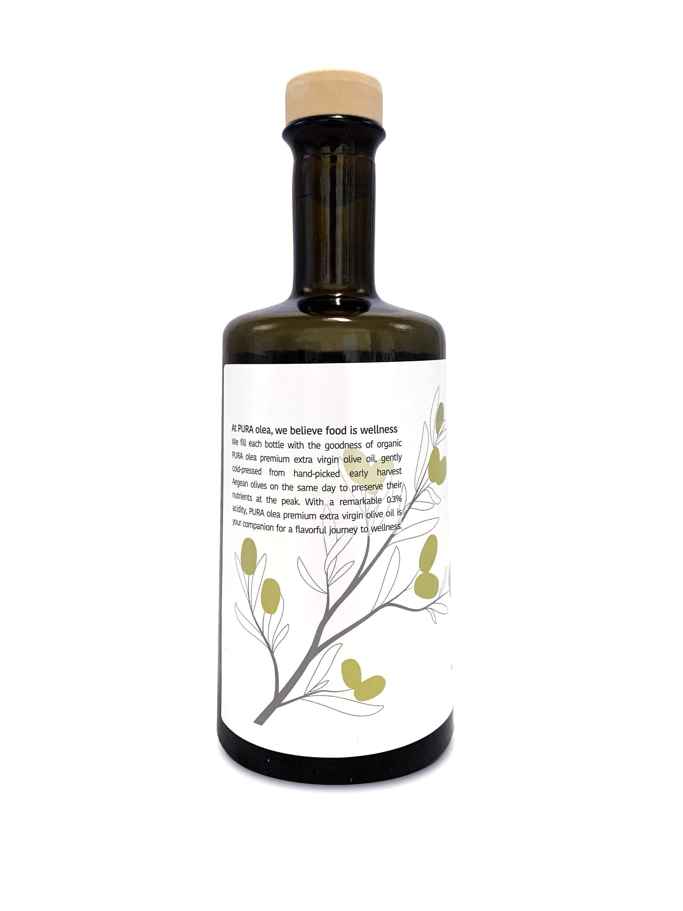 A bottle of PREMIUM Organic Extra Virgin Olive Oil with a rich golden color, showcasing its purity and quality, surrounded by fresh Aegean olives.
