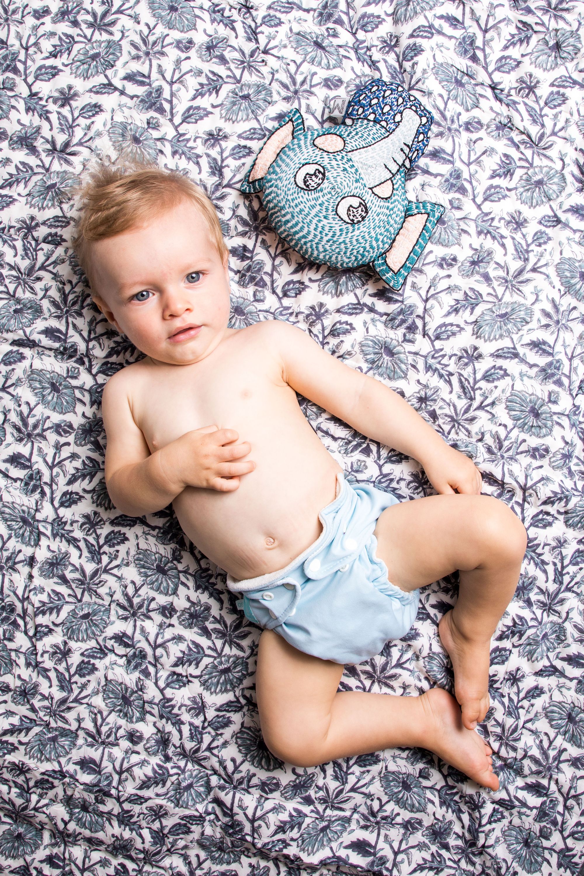 Provence Blue Cotton Quilt featuring intricate hand-stitched designs and a soft, luxurious texture, perfect for any bedroom decor.