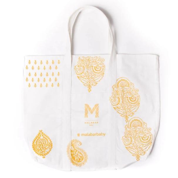 A colorful Reusable Gift Tote Bag, handmade in India, showcasing its spacious design and eco-friendly materials.