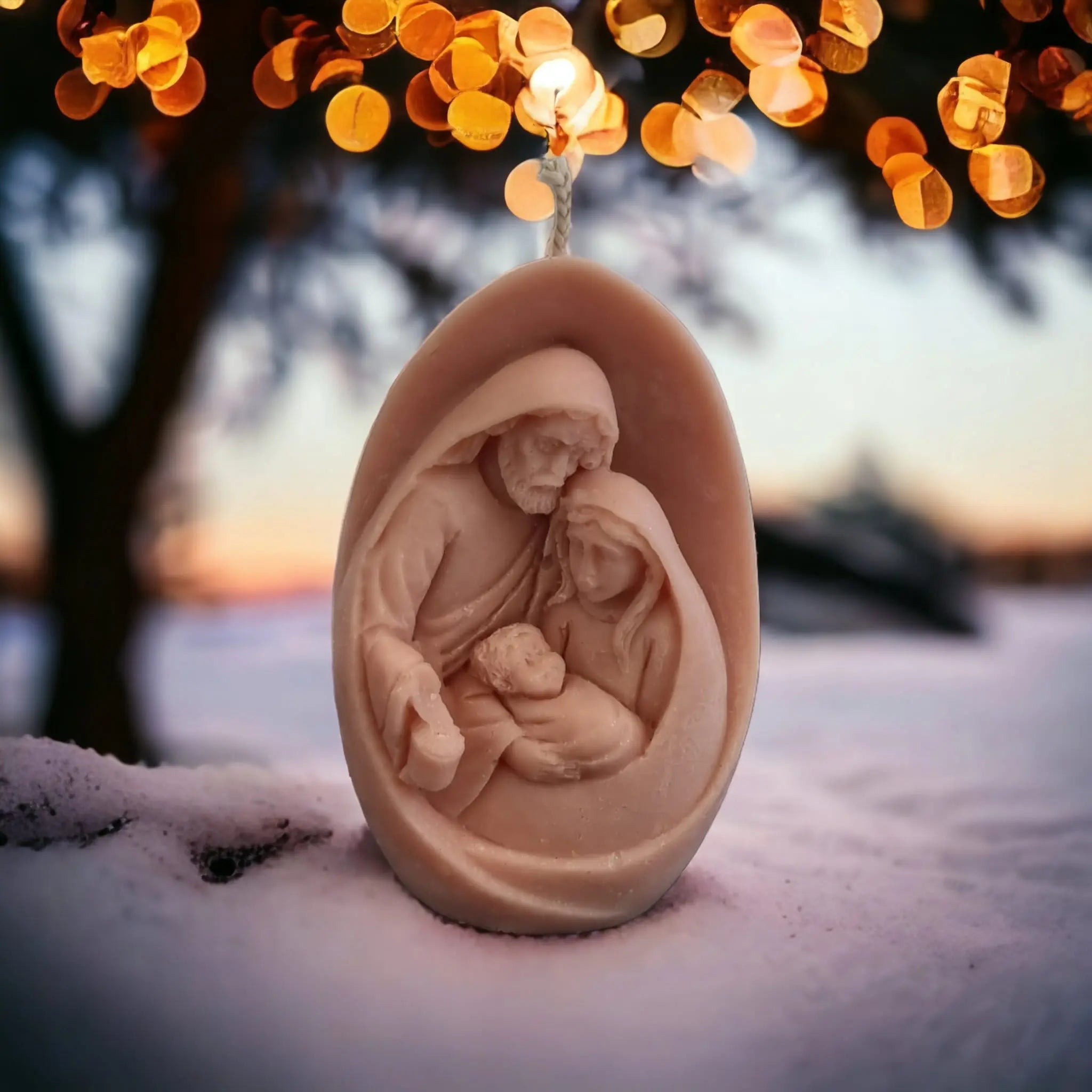 A beautifully designed bottle of Rosemary & Wreath scented essence, symbolizing the Birth of Christ, with a serene and elegant appearance.