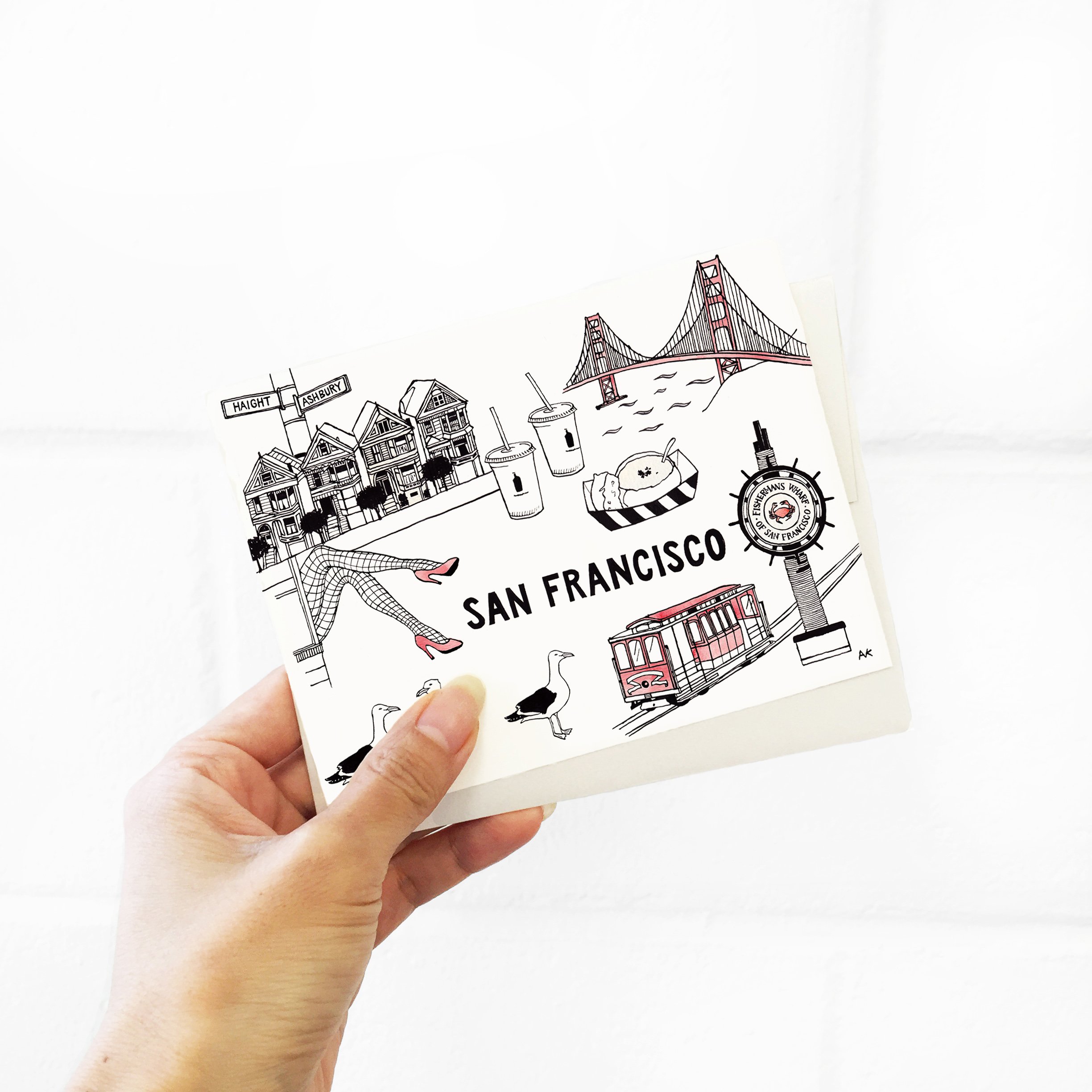 A beautifully illustrated card featuring the iconic San Francisco skyline, printed on recycled paper with a quartz metallic envelope.
