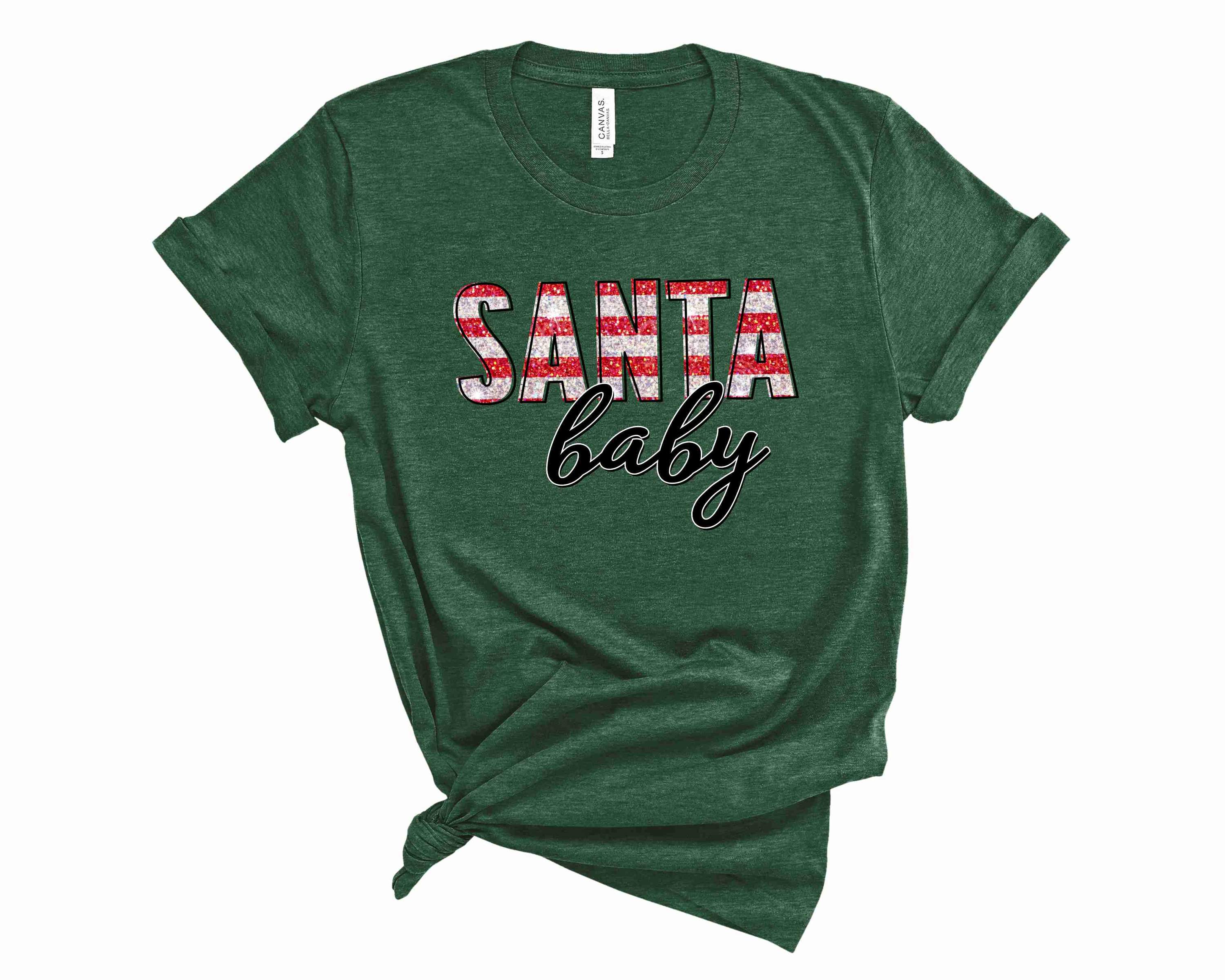Santa Baby Graphic Tee featuring a festive design, perfect for holiday celebrations.