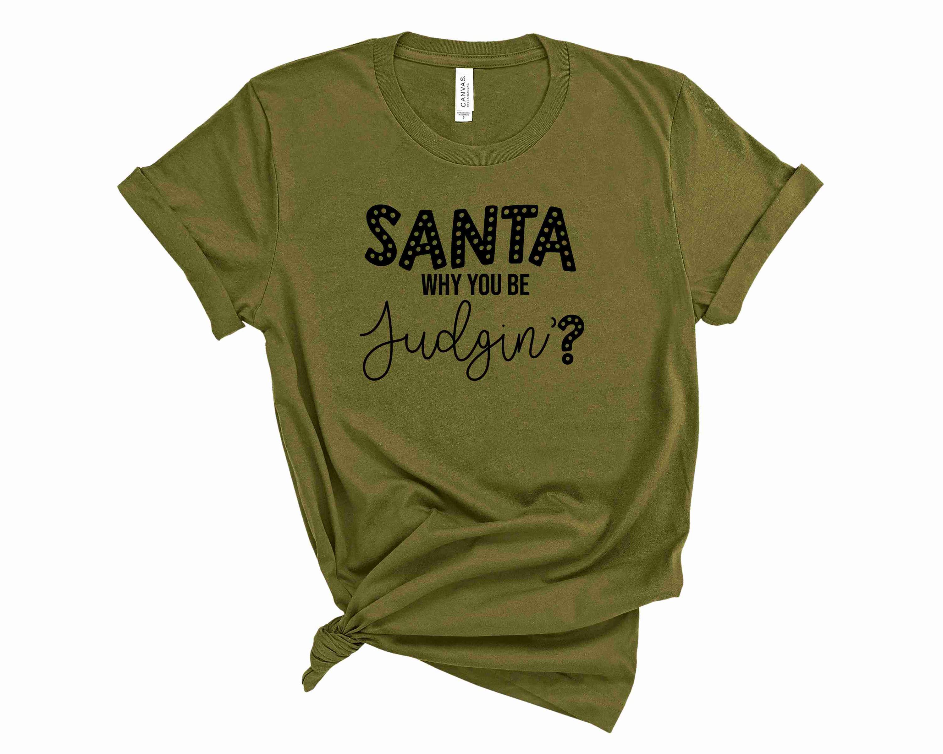 Santa Judgin Graphic Tee featuring a festive design, suitable for unisex wear.