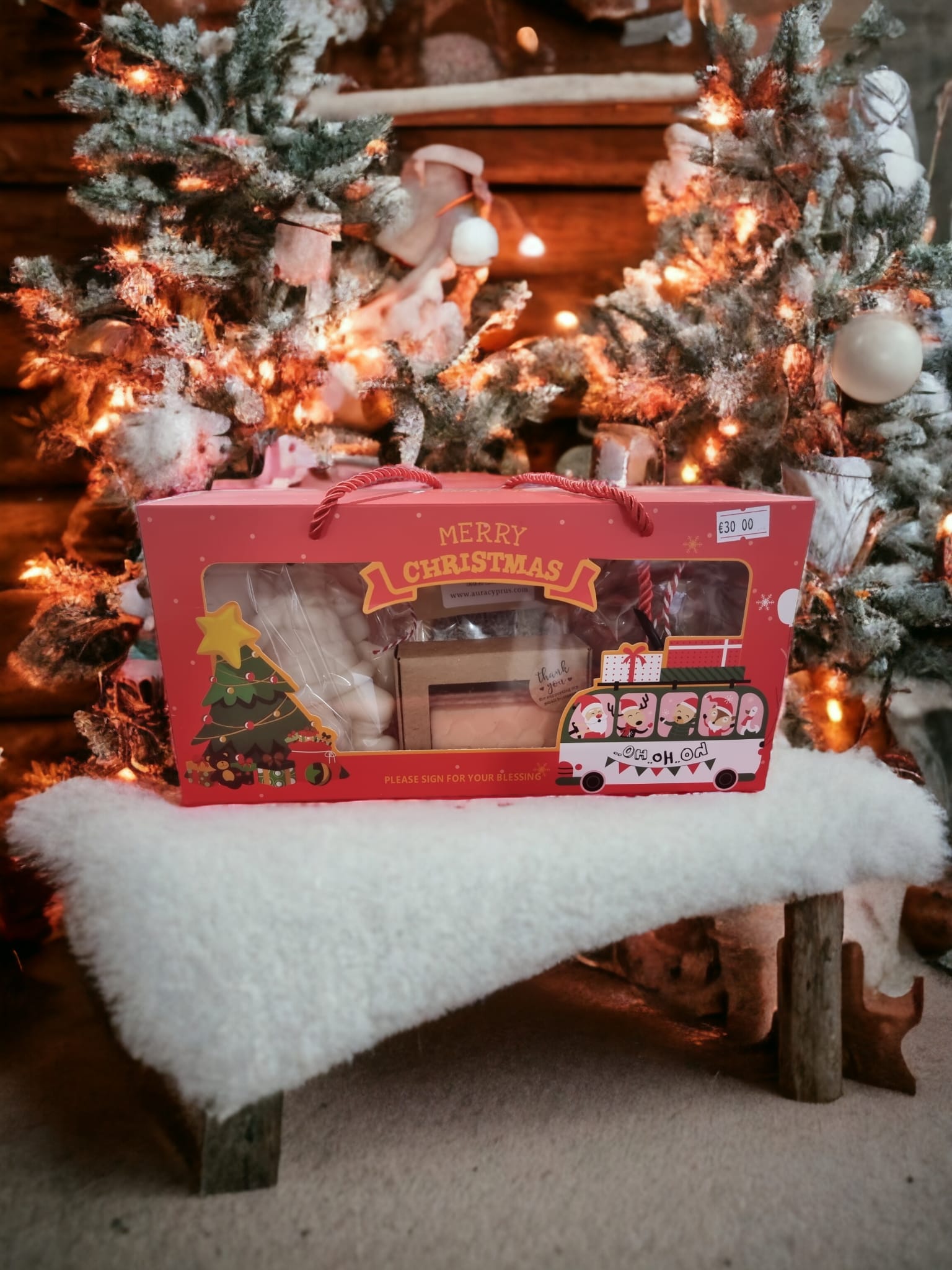 Santa's Treasure Christmas Medium Box featuring scented candles, wax melts, bath salts, and artisanal soaps for a festive holiday experience.