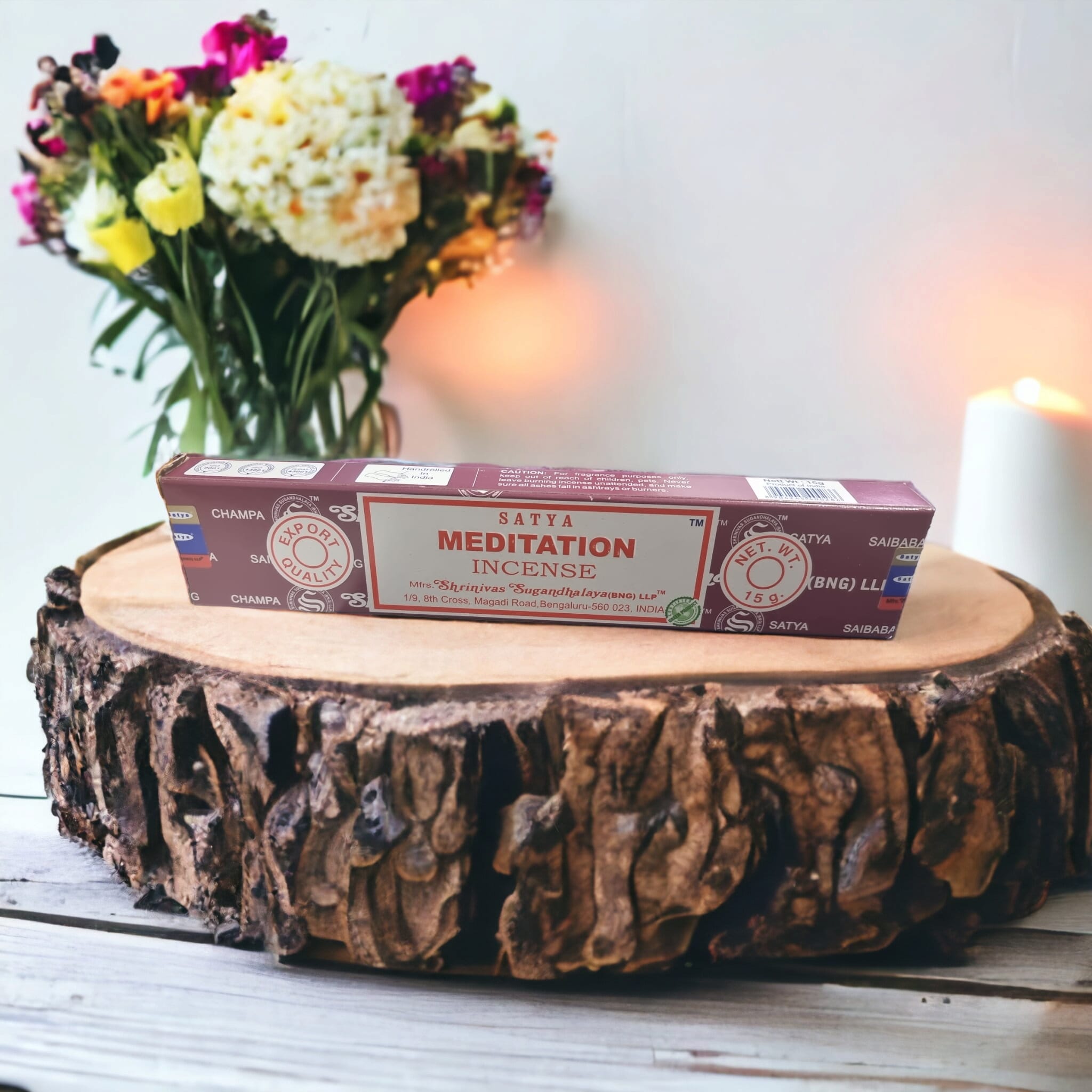 A pack of Satya Meditation Incense Sticks featuring vibrant colors and intricate designs, showcasing the hand-rolled quality of the incense.