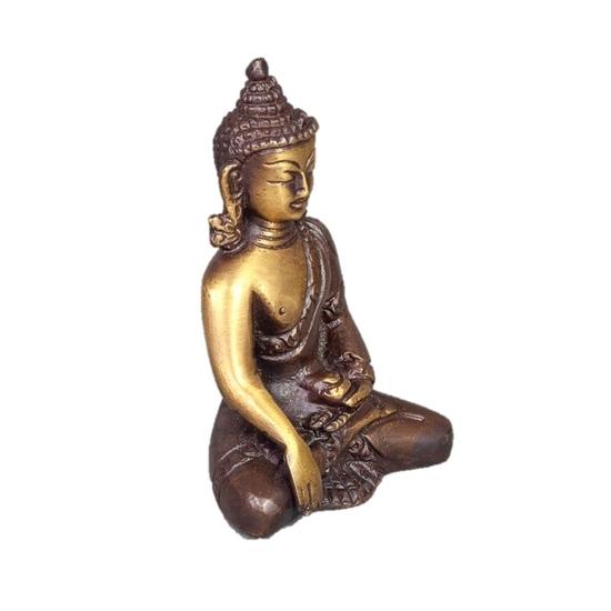 A beautifully crafted two-tone brass Sitting Buddha statue in meditation pose, showcasing intricate details and serene expression.
