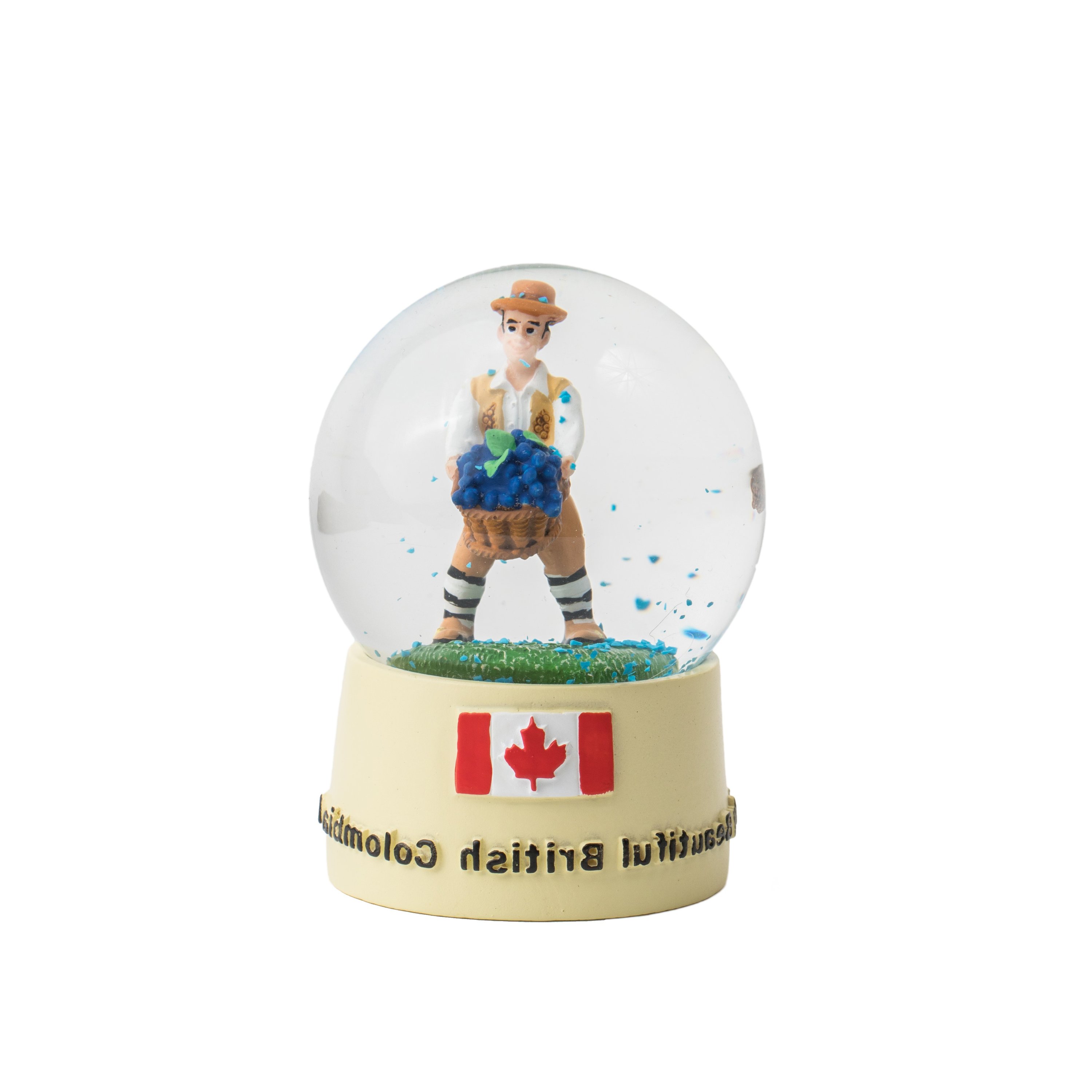 A beautifully crafted snow globe featuring a farmer figurine with a grape harvest basket, surrounded by blue snowflakes and the Canadian flag.