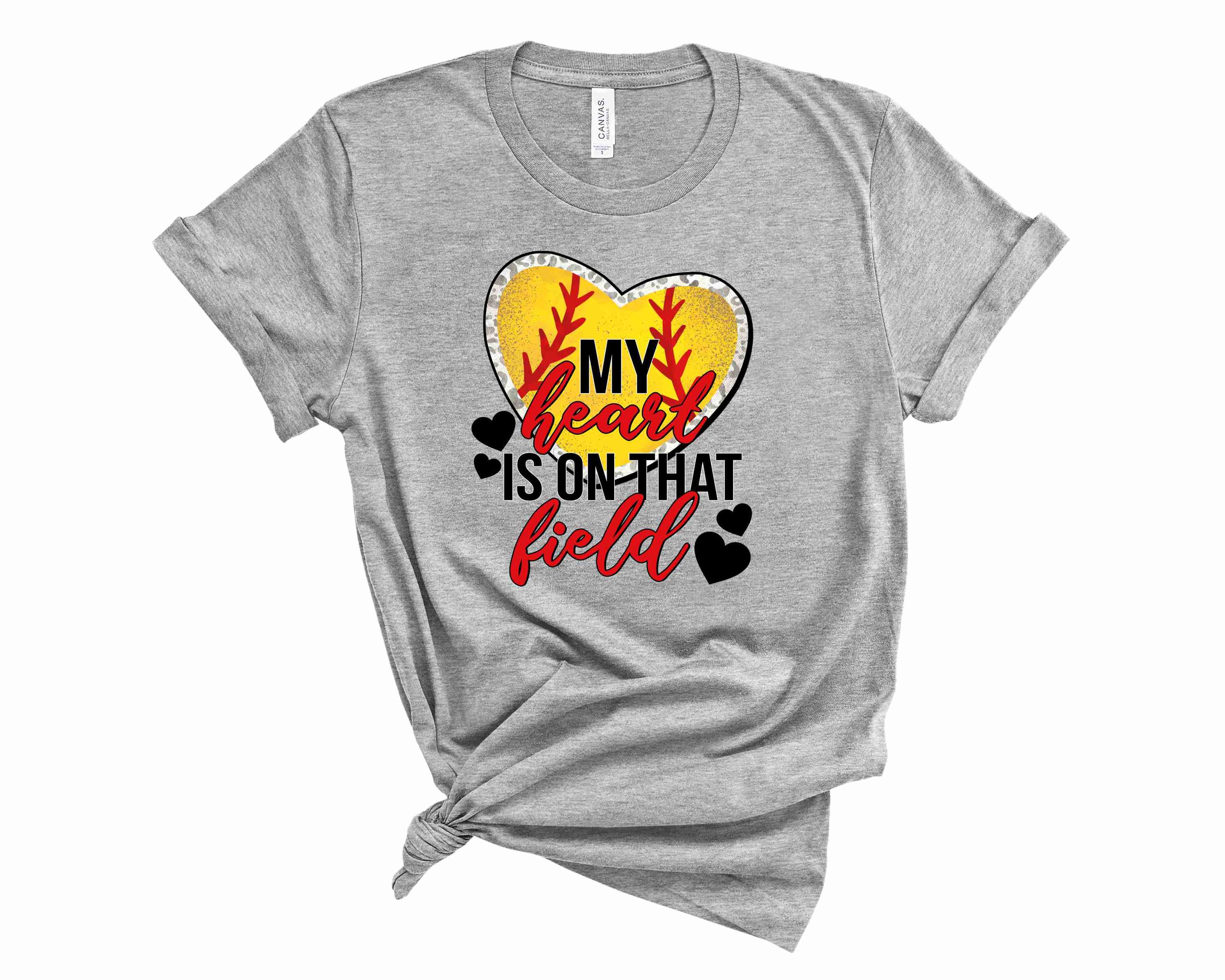Unisex graphic tee featuring 'Softball My Heart is on that Field' design, perfect for softball fans.