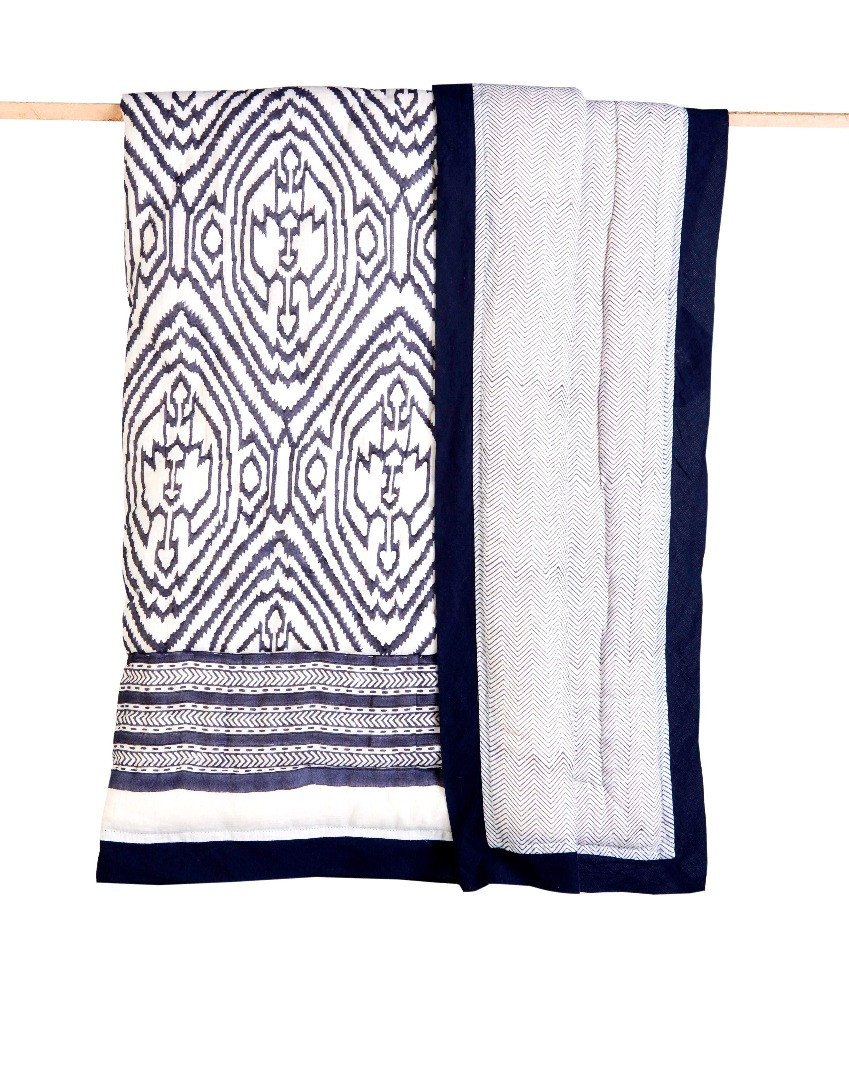 Southside Blue Cotton Quilt featuring unique hand quilted design and reversible pattern, made from hypoallergenic cotton.