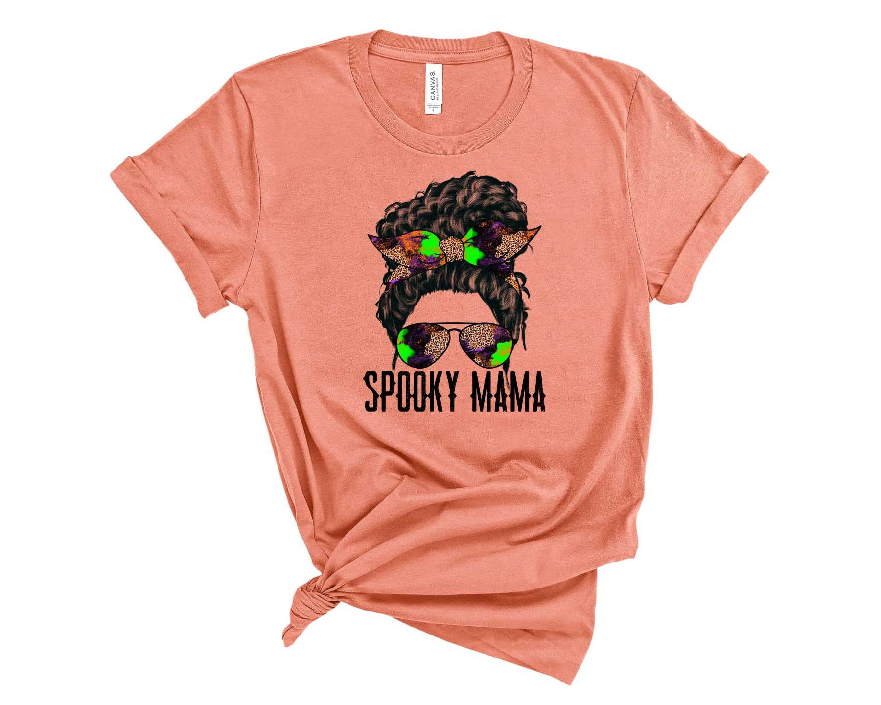Spooky Mama Curly Graphic Tee featuring a fun Halloween design, perfect for unisex wear.