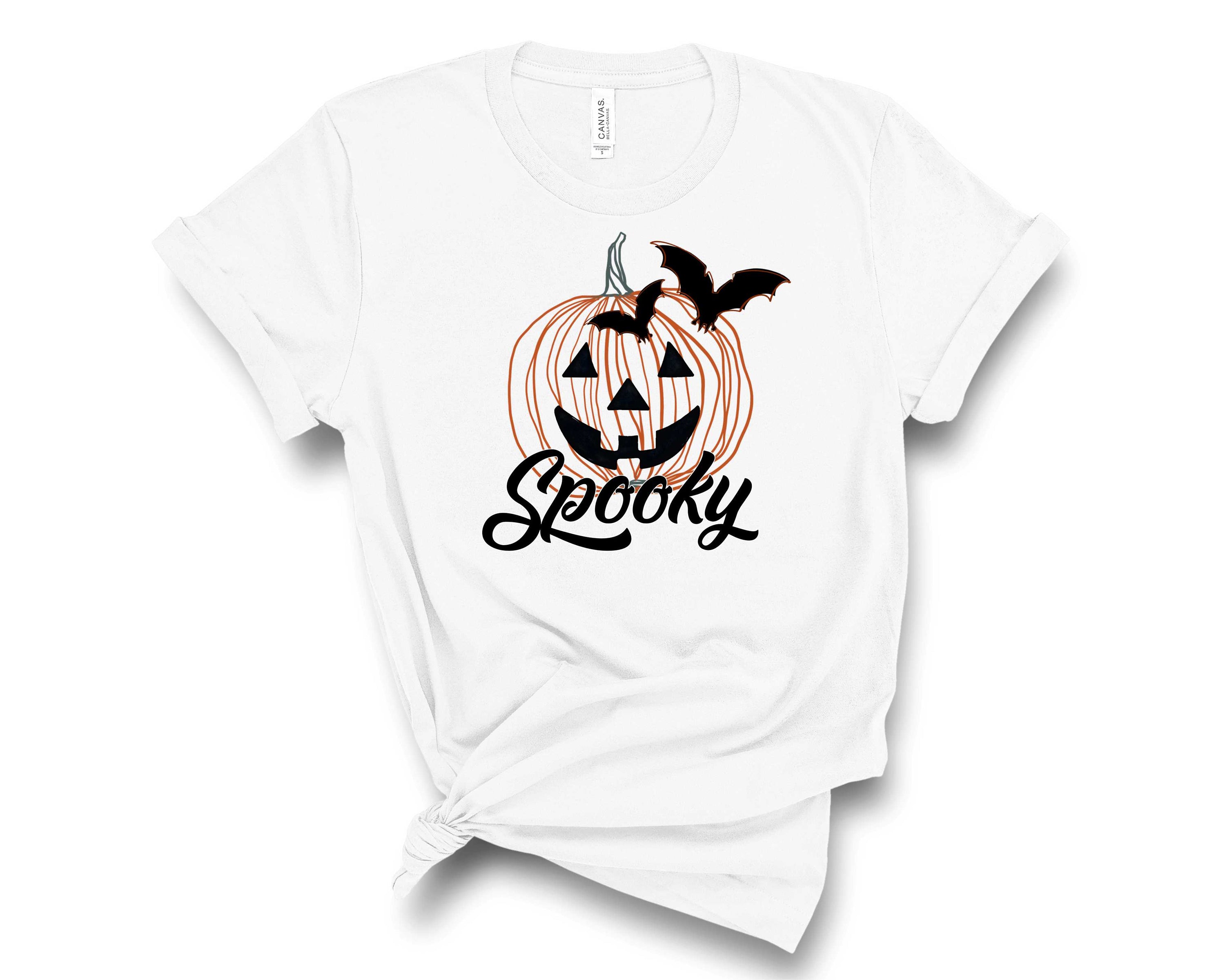 A unisex graphic tee featuring a spooky pumpkin design, perfect for Halloween celebrations.