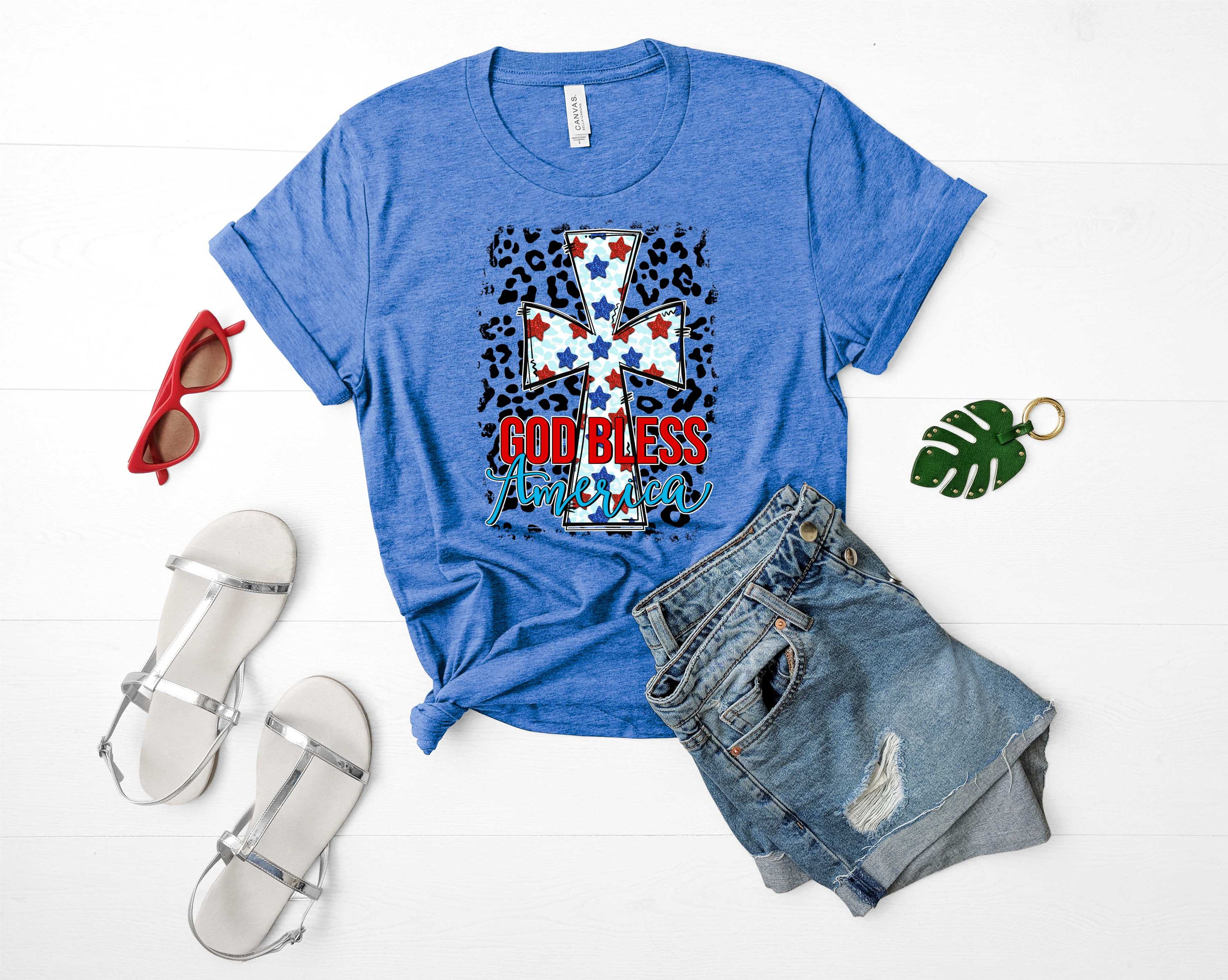 Unisex Star Cross God Bless America graphic tee featuring a bold print and comfortable fit.