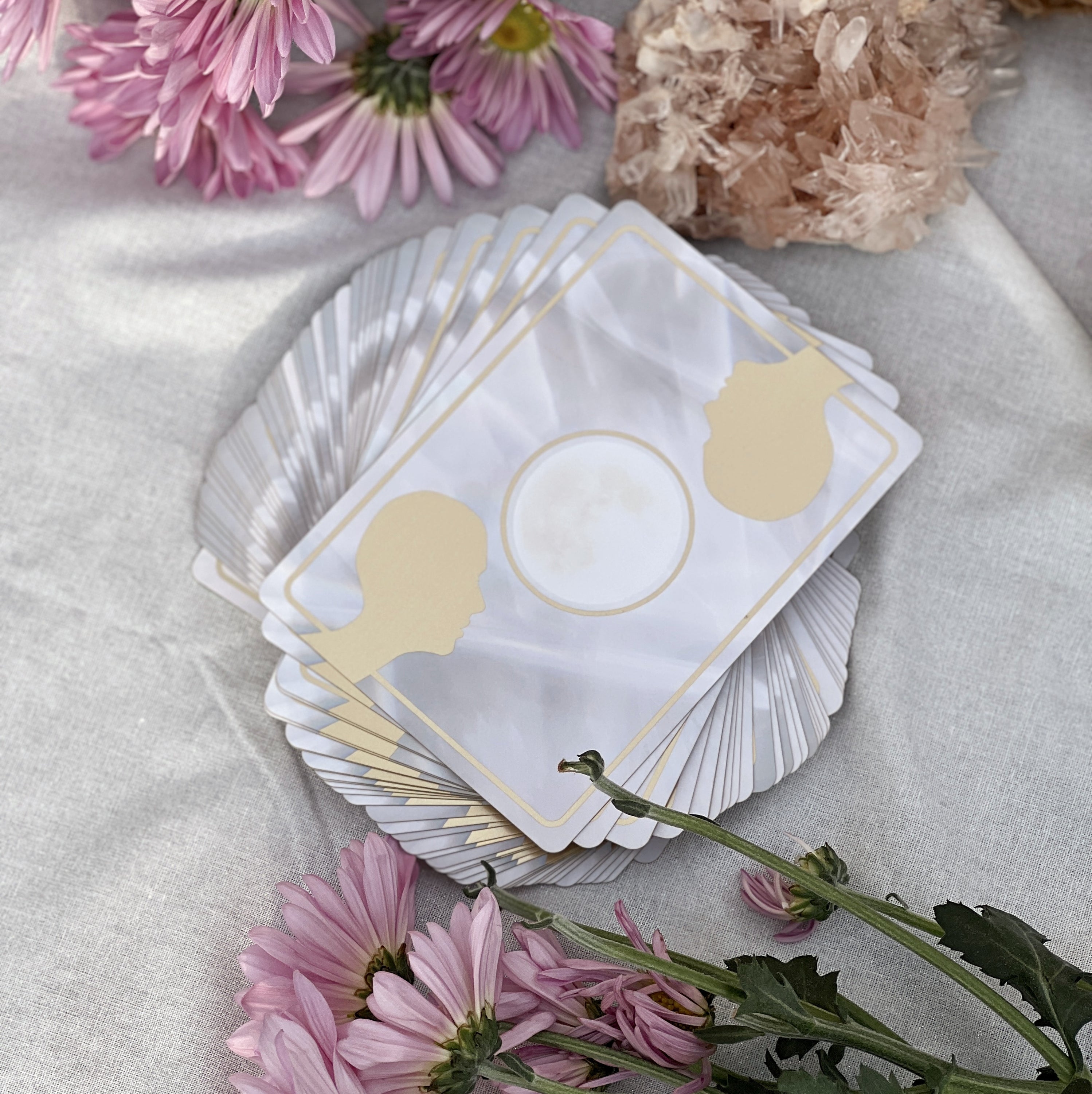 Starlight Frequencies Oracle Deck featuring 44 cards with gold foil accents and a velvet texture, displayed in a magnetic flip box.