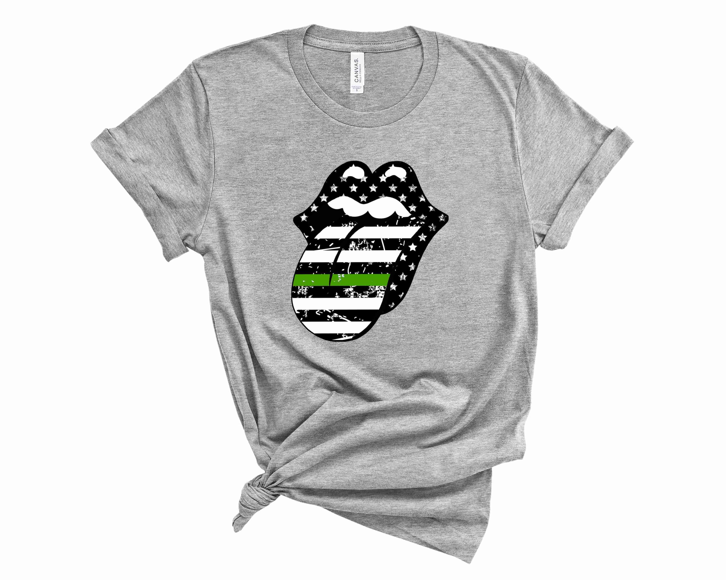 A stylish unisex graphic tee featuring stars and a green stripe tongue design, perfect for casual wear.