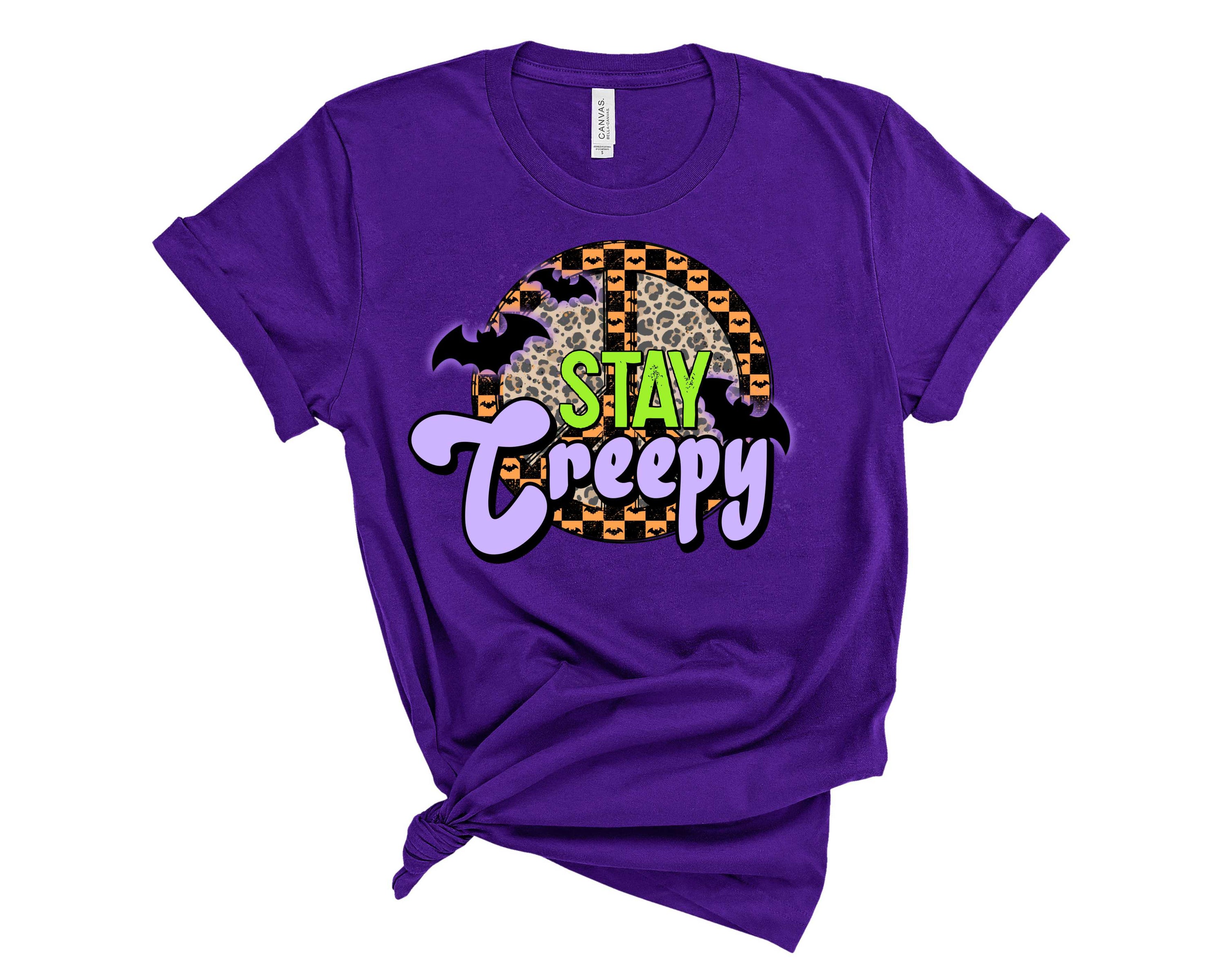 Stay Creepy Graphic Tee featuring a unique spooky design on a soft unisex t-shirt.