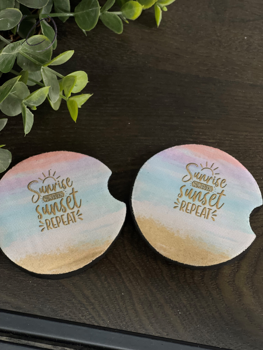 Sunrise, Sunburn car coaster set featuring vibrant design and durable neoprene material, perfect for vehicle cup holders.