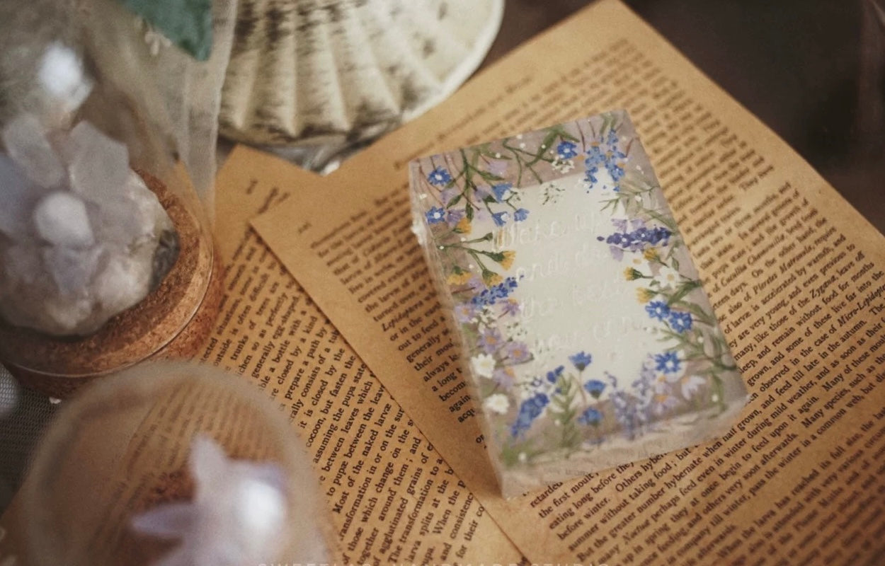 A beautifully packaged Summer Garden Lavender & Chamomile Aromatic Soap, featuring a floral design and vibrant colors, evoking a serene garden atmosphere.