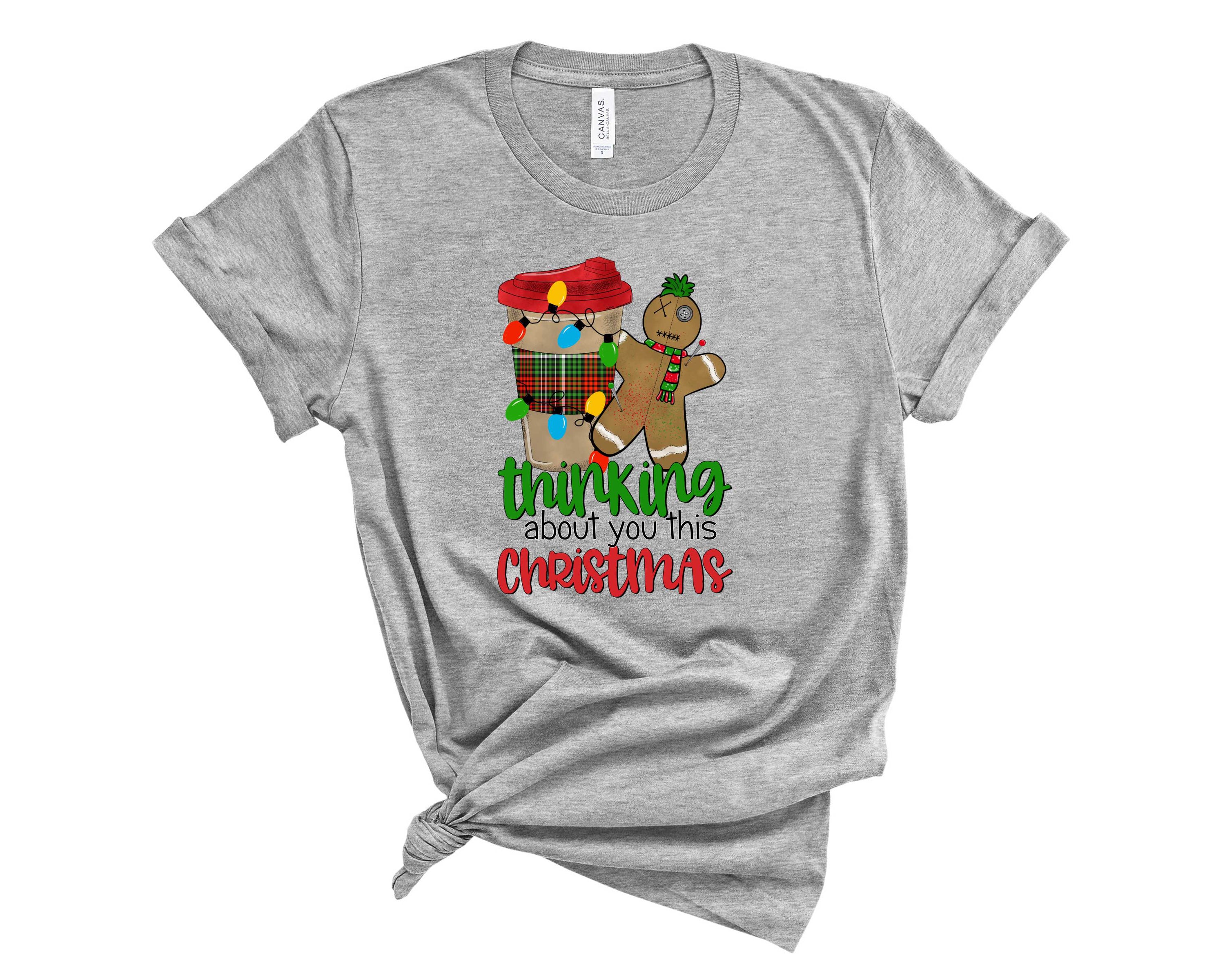 Unisex Thinking About You This Christmas graphic tee featuring a festive design, perfect for holiday celebrations.