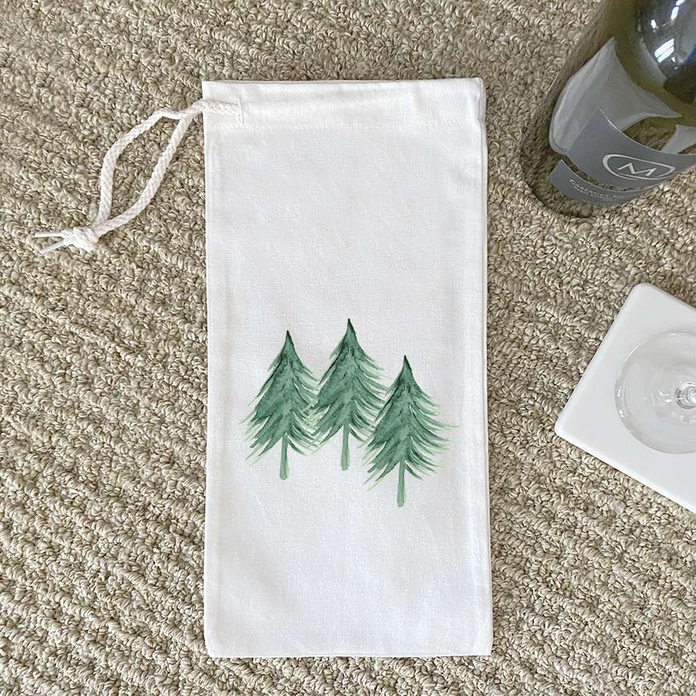 Three Trees Canvas Wine Bag in natural cotton color with drawstring closure, designed to hold a standard 750mL wine bottle.