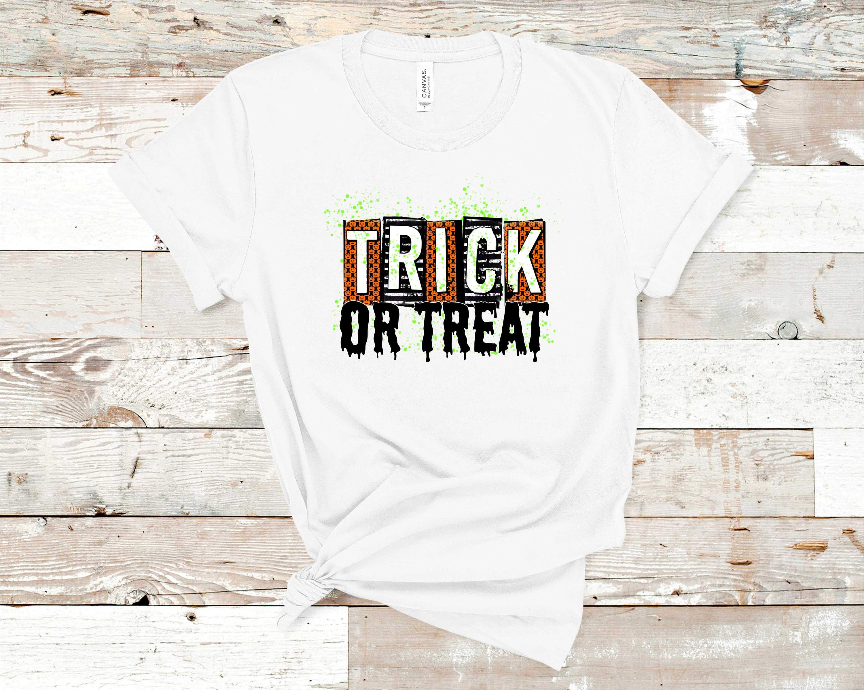 Trick or Treat Graphic Tee featuring a vibrant Halloween design on a Bella Canvas unisex t-shirt.